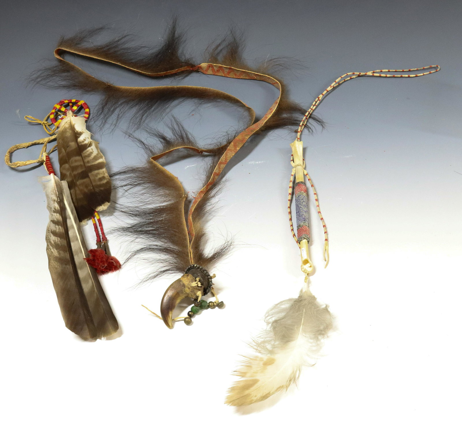 LOT OF NATIVE AMERICAN NECKLACES: (3) INCLUDING - WRAPPED QUIL AND FEATHERS, BEAR CLAW AND FUR, AND BONE WITH BEADED WRAP UPDATED 2023 TERMS FOR PURCHASING AND SHIPPING OF AUCTION ITEMS. PLEASE READ CAREFULLY BEFORE BIDDING. ALL PAYME