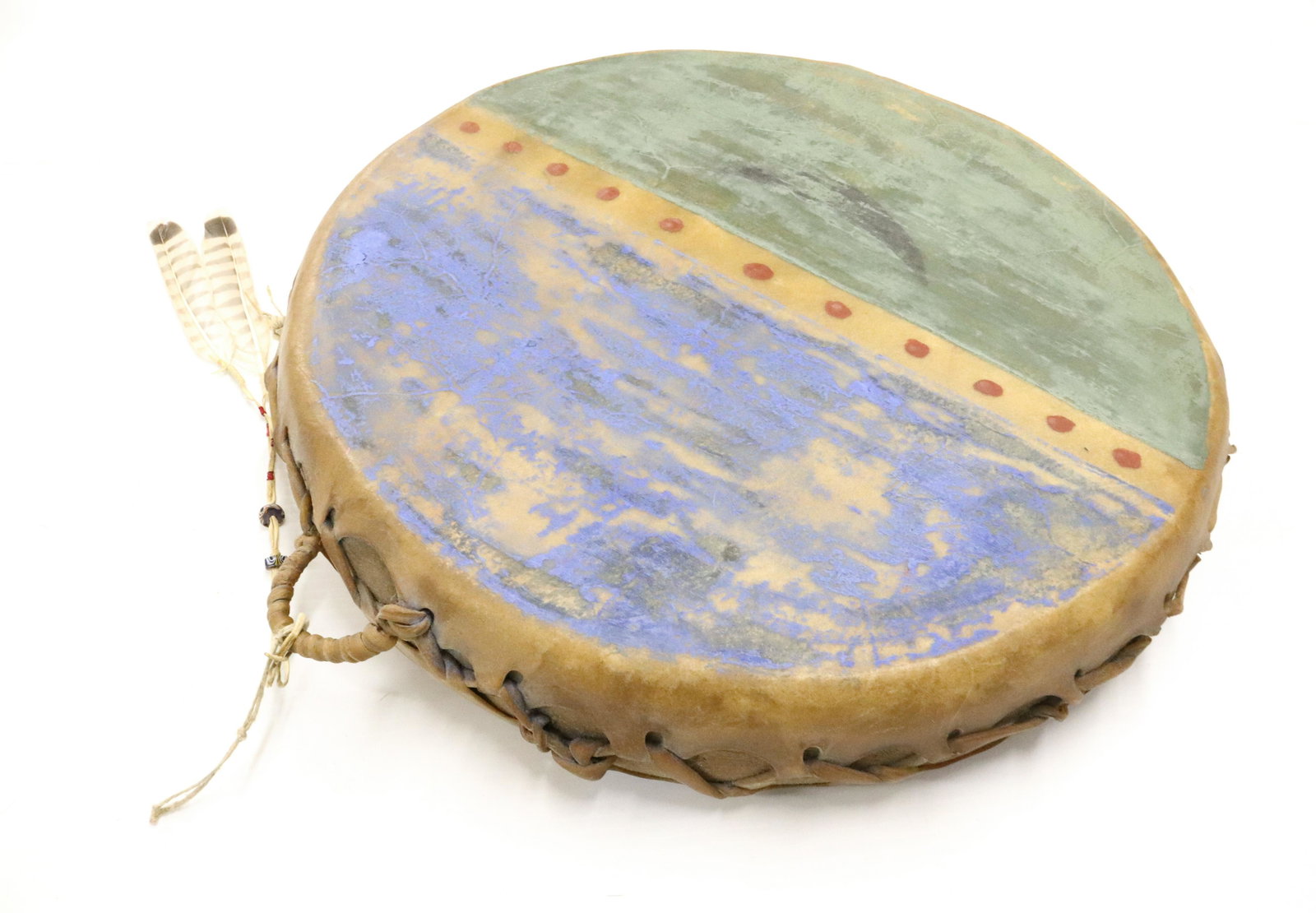NATIVE AMERICAN DRUM: PAINTED LEATHER DRUM - 17" D UPDATED 2023 TERMS FOR PURCHASING AND SHIPPING OF AUCTION ITEMS. PLEASE READ CAREFULLY BEFORE BIDDING. ALL PAYMENTS FOR PURCHASES WILL BE MADE THROUGH LIVEAUCTIONEERS.COM 