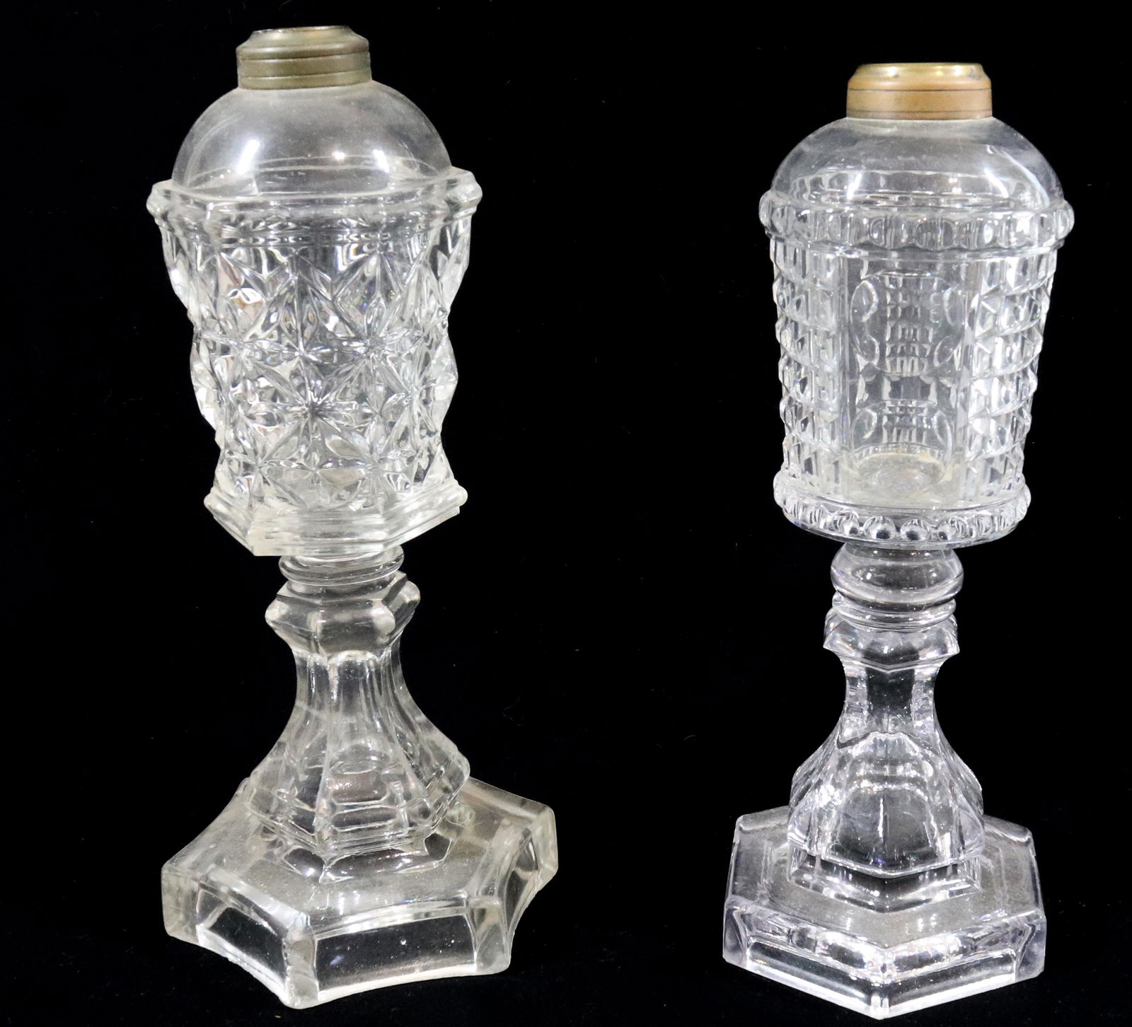 (2) PRESSED FLINT GLASS WHALE OIL LAMPS: SANDWICH STAR AND WAFFLE & THUMBPRINT WAFER STEMS 10 1/2" 10 3/4"H Please Read Carefully before Bidding. Hartzell’s Auction Gallery Inc. will Conduct an ON-SITE and also ON-LINE Auction at 2481