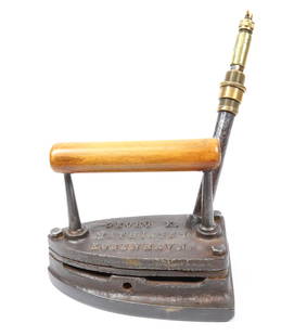 DANISH GAS IRON: GEORGE E. MATHIASEN, KOBENHAVN. SIXTY DEGREE ANGLE BRASS PIPE. 7 1/2" L. Terms: PLEASE READ CAREFULLY BEFORE BIDDING. THIS IS AN ONLINE ONLY AUCTION. PREVIEWS WILL BE - WEDNESDAY APRIL 26TH,