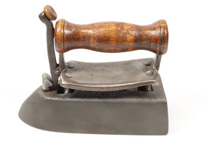 A.BADER CANNSTATT COLD HANDLE IRON: GERMAN IRON WITH FRONT RELEASE IRON. 6 1/2". Terms: PLEASE READ CAREFULLY BEFORE BIDDING. THIS IS AN ONLINE ONLY AUCTION. PREVIEWS WILL BE - WEDNESDAY APRIL 26TH, THURSDAY APRIL 27TH FROM 9:00 AM