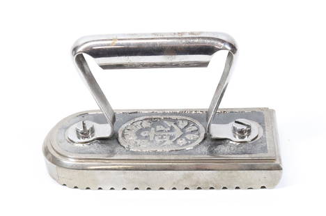 FRENCH POLISHING IRON: MRKD. BREVETE AND INITIALED C.F. WITH ANCHOR AT TOP. BRICK POLISHING BOTTOM. NICKEL PLATED. 6 1/4" L. Terms: PLEASE READ CAREFULLY BEFORE BIDDING. THIS IS AN ONLINE ONLY AUCTION. PREVIEWS WILL