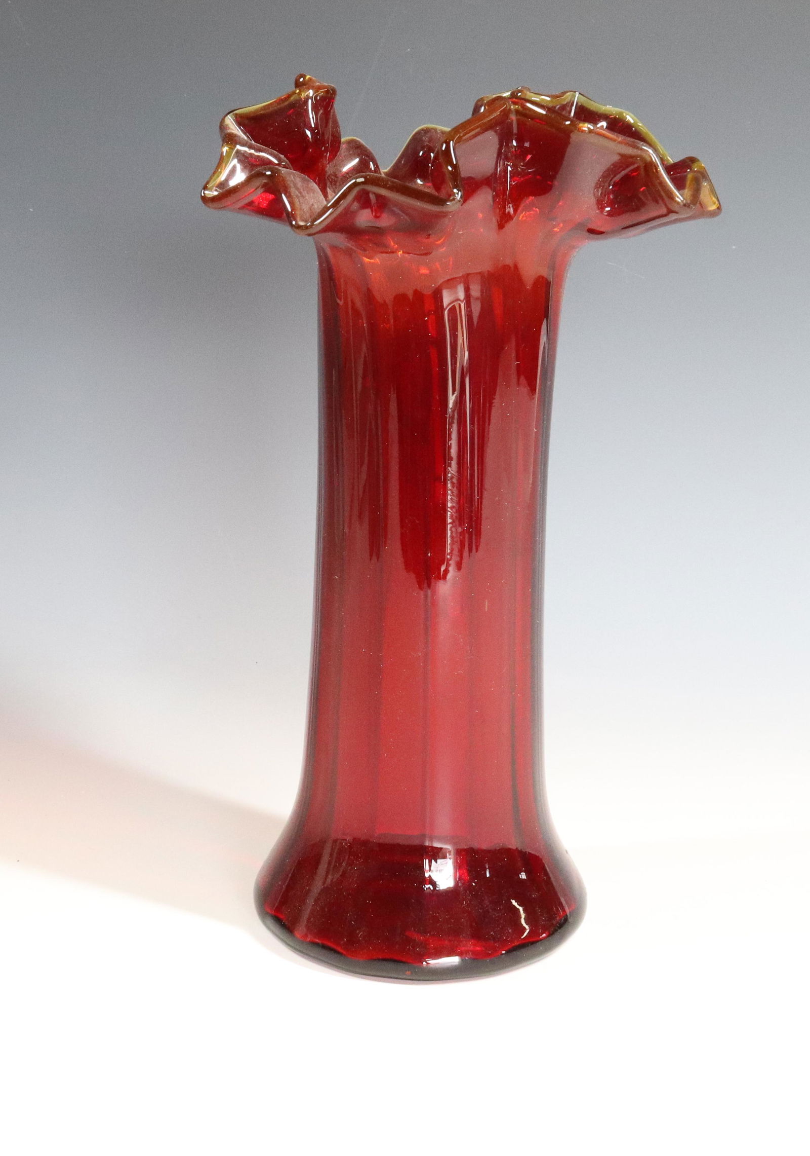 AMBERINA VASE: RUFFLE RIM PONITL 9" Terms: Please Read Carefully before Bidding. Hartzell’s Auction Gallery Inc. will Conduct an ON-LINE ONLY Auction at 2481 Belvidere Rd, Phillipsburg, Nj. 08865. There will be Fo