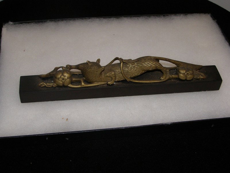 CARVED GILT WOOD ANIMAL WITH VINE AND FLORAL DESIG: CARVED GILT WOOD ANIMAL WITH VINE AND FLORAL DESIGN. 9" x 2"