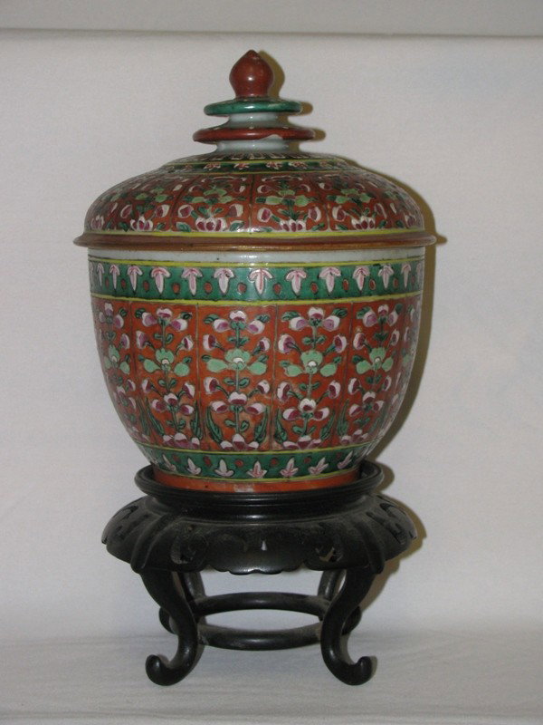 EARLY PORCELAIN POT WITH HARDWOOD STAND AND FLORA: EARLY PORCELAIN POT WITH HARDWOOD STAND AND FLORAL DESIGN 8" WITH SMALL HAIR LINE CRACK