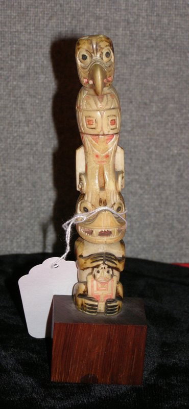 CARVED IVORY TOTEM POLE 7 1/4" ON WOODEN BASE : CARVED IVORY TOTEM POLE 7 1/4" ON WOODEN BASE