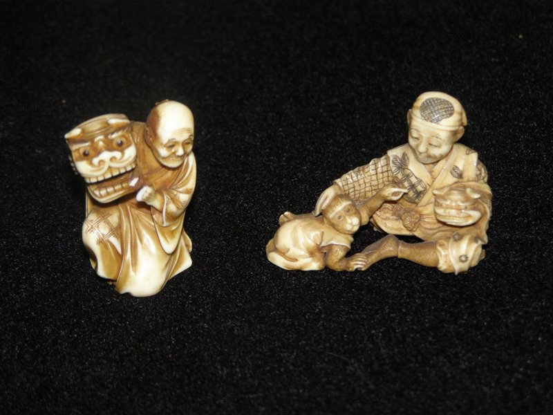 PR. CARVED IVORY NETSUKE - MAN WITH MONKEY AND DR: PR. CARVED IVORY NETSUKE - MAN WITH MONKEY AND DRAGON - MAN HOLDING A DRAGON MASK 1 1/8" & 1 1/2"
