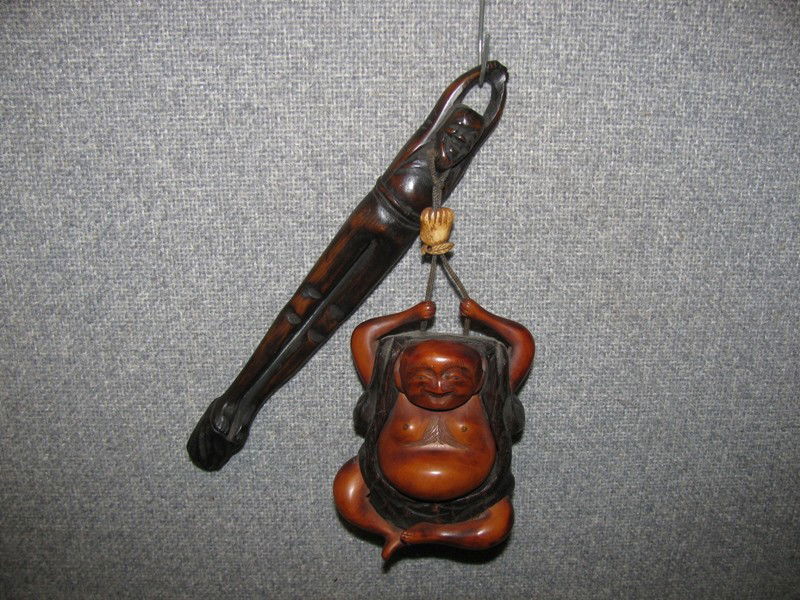 CARVED POSSIBLY BOXWOOD BUDDAH OPIUM OR TOBACCO HO: CARVED POSSIBLY BOXWOOD BUDDAH OPIUM OR TOBACCO HOLDER WITH LIFT UP BELLY AND CARVED MAN HANDLE - (BUDDAH 3 1/2" X 3") AND CARVED HANDLE 8"