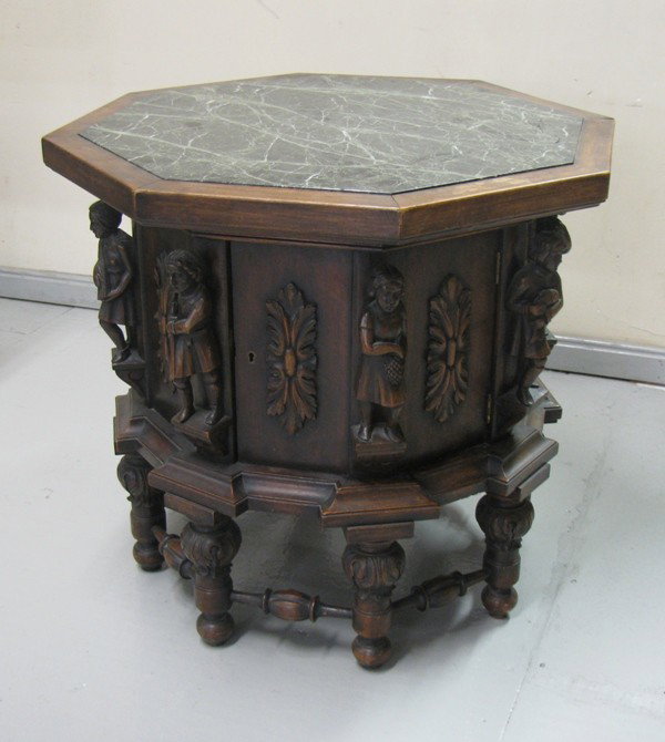 CARVED FIGURE MARBLE TOP DRUM TABLE WITH CRACK IN: CARVED FIGURE MARBLE TOP DRUM TABLE WITH CRACK IN TOP 27" X 27" X 25"