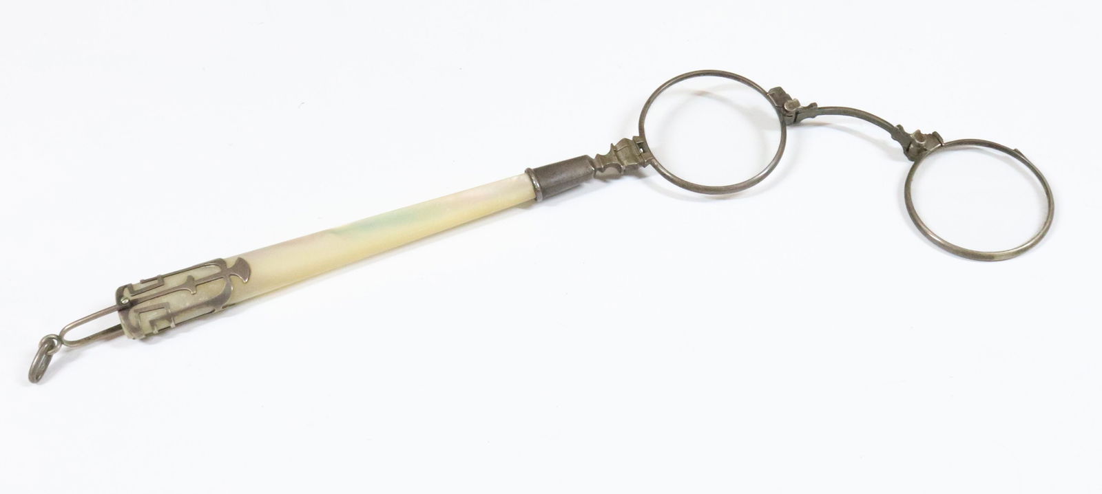 AUSTRIA SILVER HAND HELD EYEGLASS: FOLDING SILVER WITH HALLMARK ON BRIDGE BAUHAUS DECORATION MOTHER OF PEARL 800 SILVER WORKING MECHANISM 7" X 4 1/4" TERMS: UPDATED 2023 TERMS FOR PURCHASING AND SHIPPING OF AUCTION ITEMS. PLEASE READ C