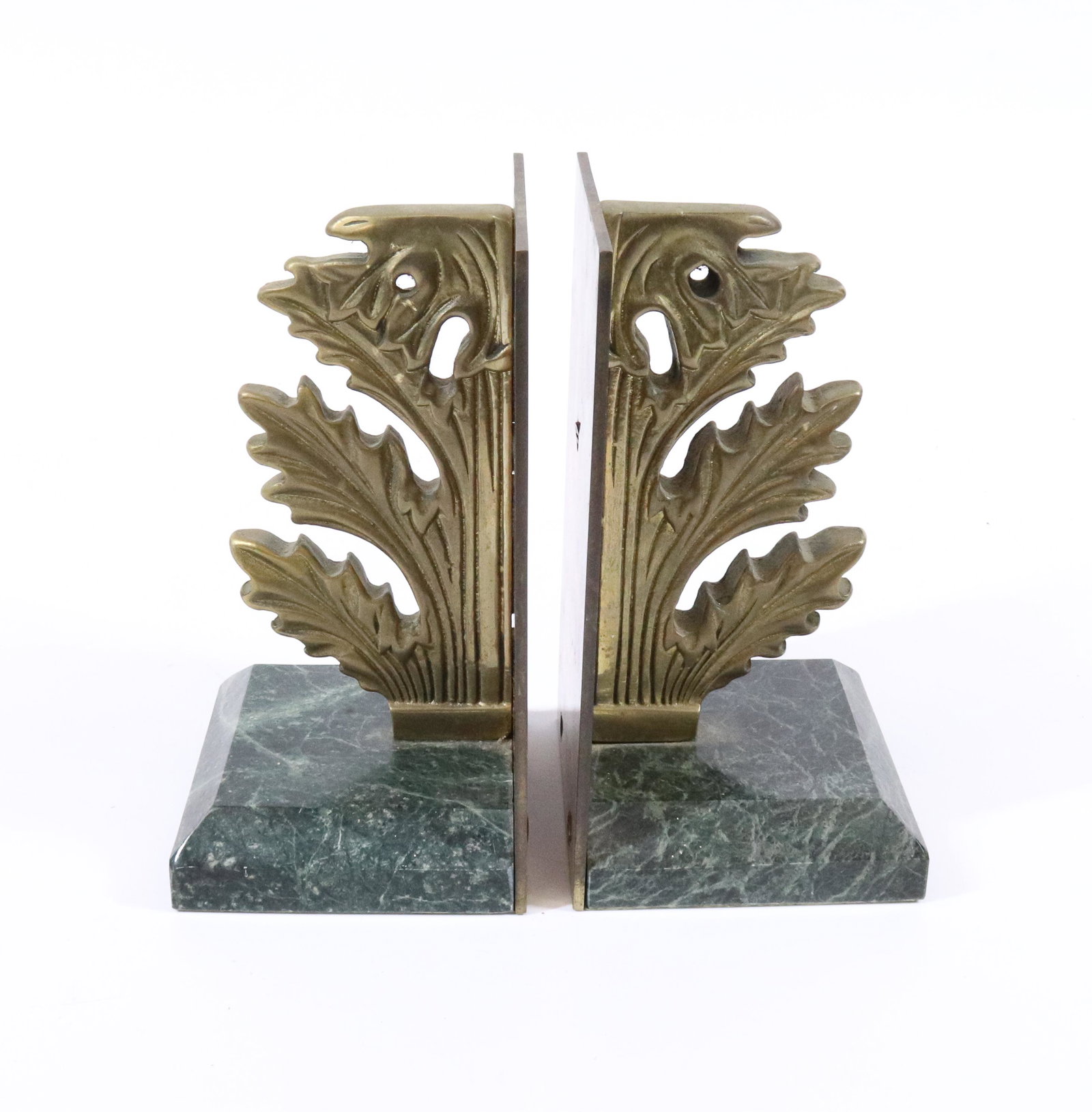 PAIR OF BRASS/MARBLE BOOKENDS: 7" H. TERMS: UPDATED 2023 TERMS FOR PURCHASING AND SHIPPING OF AUCTION ITEMS. PLEASE READ CAREFULLY BEFORE BIDDING. ALL PAYMENTS FOR PURCHASES WILL BE MADE THROUGH LIVEAUCTIONEERS.COM PAYMENT PROCESSI