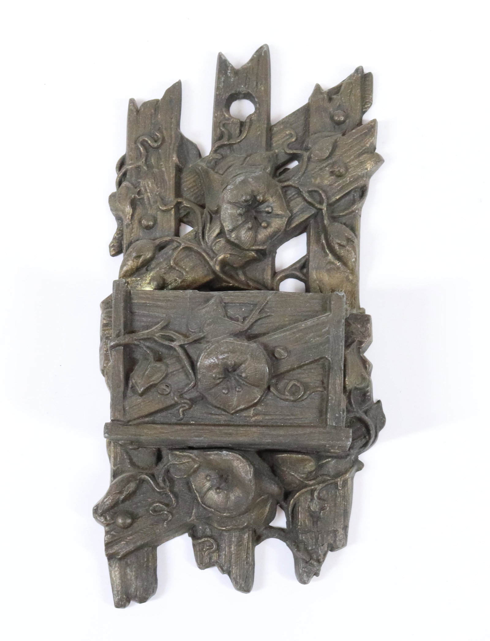 CAST IRON MATCH HOLDER: FENCE AND FLORAL DESIGN. TRACES OF ORIGINAL GOLD PAINT. 8" L. TERMS: UPDATED 2023 TERMS FOR PURCHASING AND SHIPPING OF AUCTION ITEMS. PLEASE READ CAREFULLY BEFORE BIDDING. ALL PAYMENTS FOR PURCHASES W