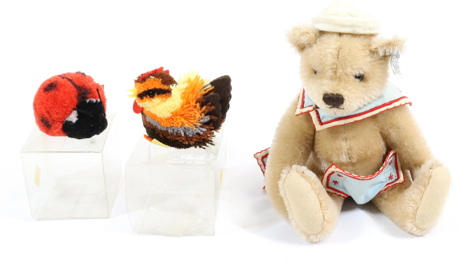 STEIFF BEAR, CHICK AND LADYBUG: BABY BEAR IN SAILOR OUTFIT WITH BUTTON/TAG IN EAR. 9 1/2" L. WOOL/COTTON. WESTERN GERMANY. CHICK HAS BUTTON/TAG ON FOOT (GERMANY). LADY BUG HAS PAPER TAG.