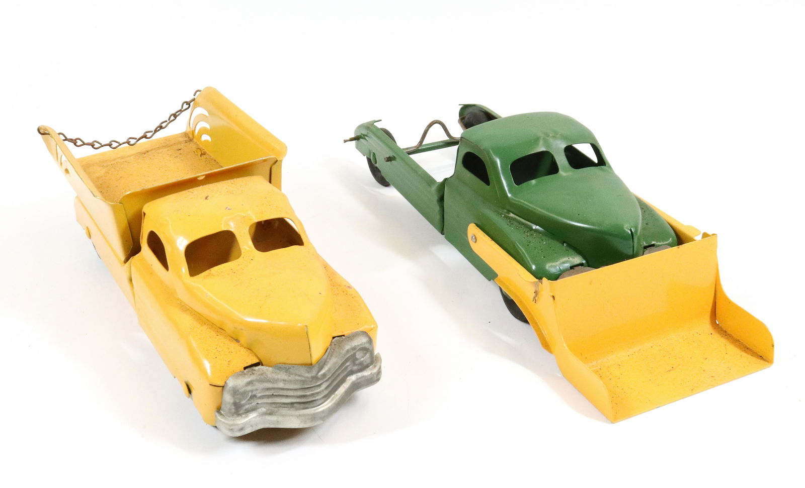 (2) BUDDY L TRUCKS: ONE WITH DUMP BODY 13 1/4" L. AND THE OTHER WITH SCOOP.