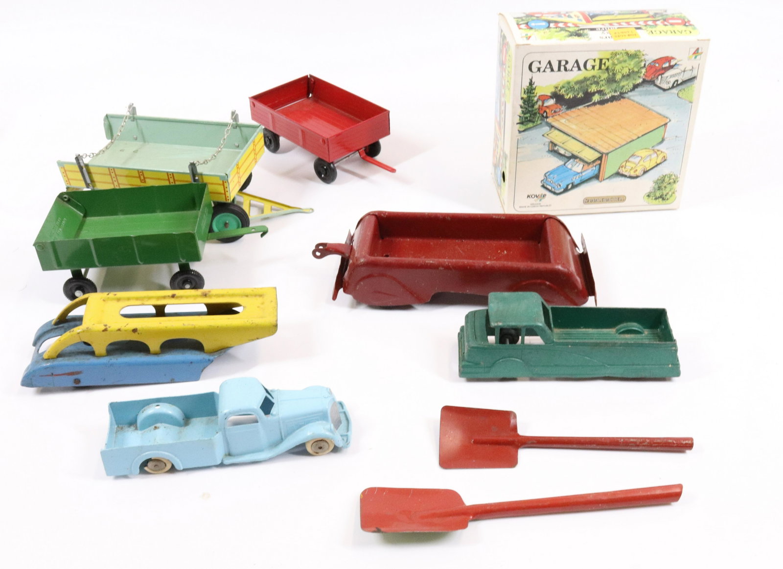 LOT OF PRESSED METAL TOYS: INCLUDING: TRUCKS, WAGON, MINI SHOVELS AND MORE.