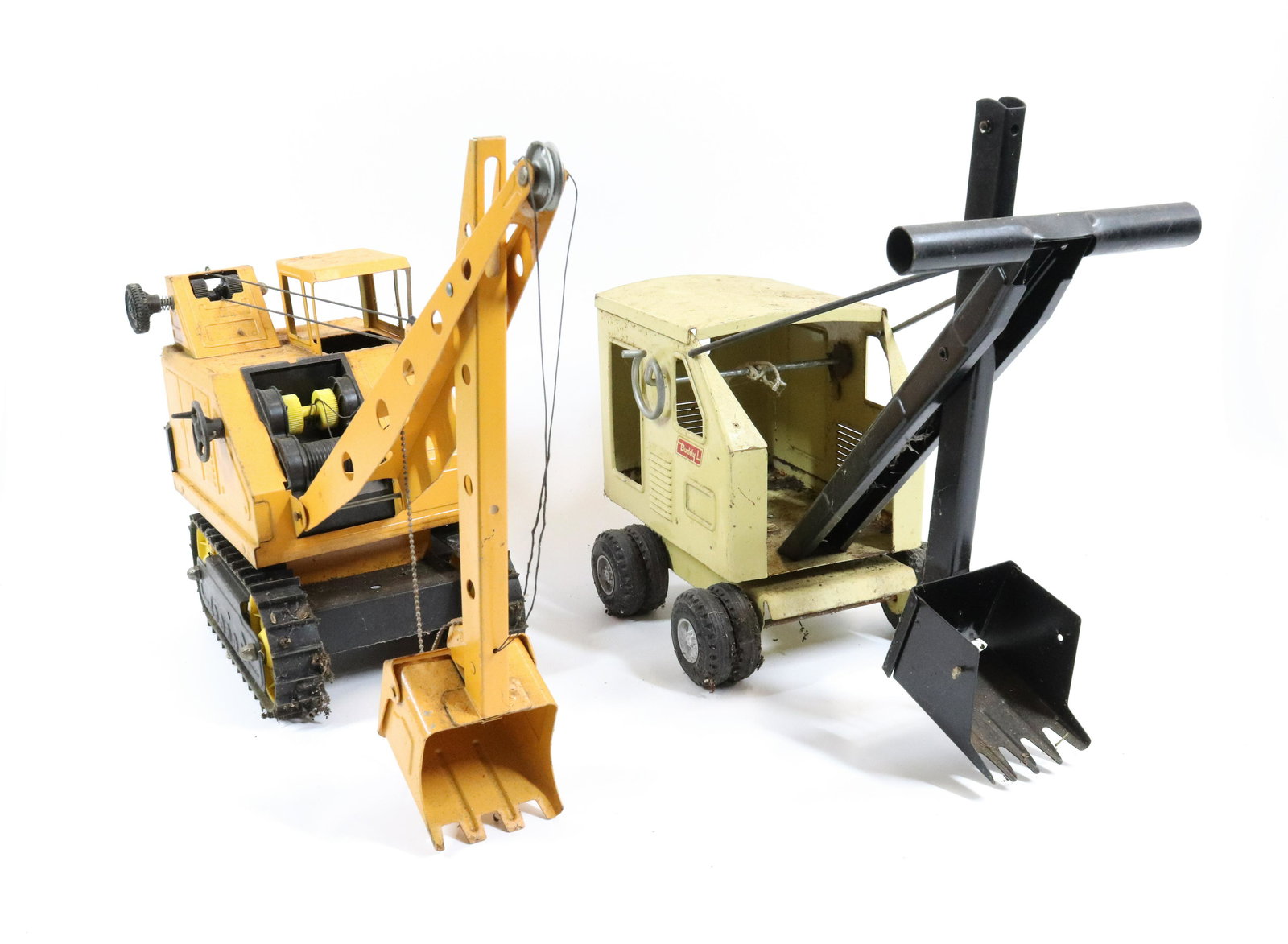 NYLINT AND BUDDY L PRESSED STEEL STEAM SHOVELS: ORANGE/BLACK AND TAN WITH ORIG. DECALS. 9" L.