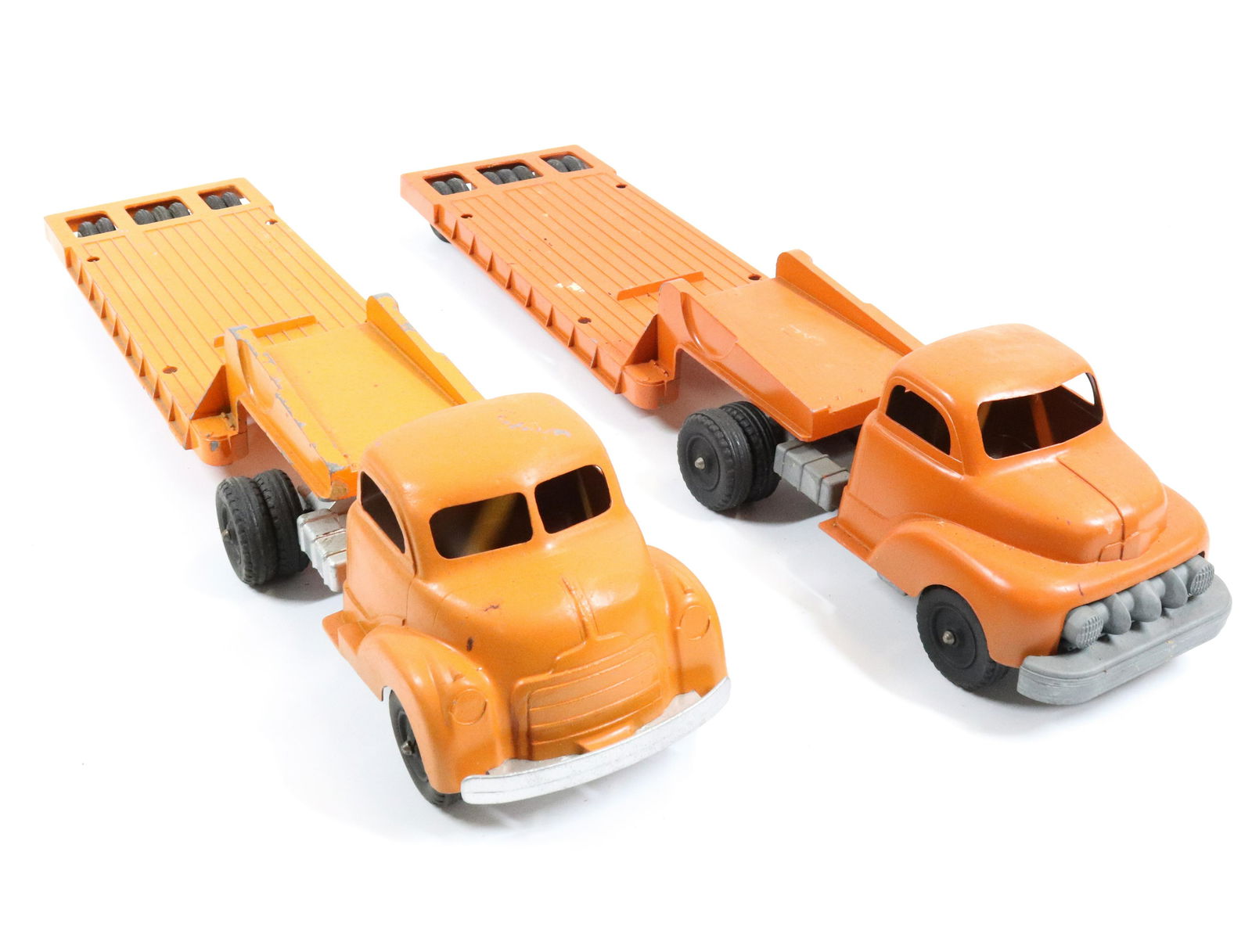 (2) HUBLEY LOWBOY TRAILERS: ORANGE/SILVER TRUCKS WITH ORANGE TRAILERS. TOTAL LENGTH 18 1/2" .