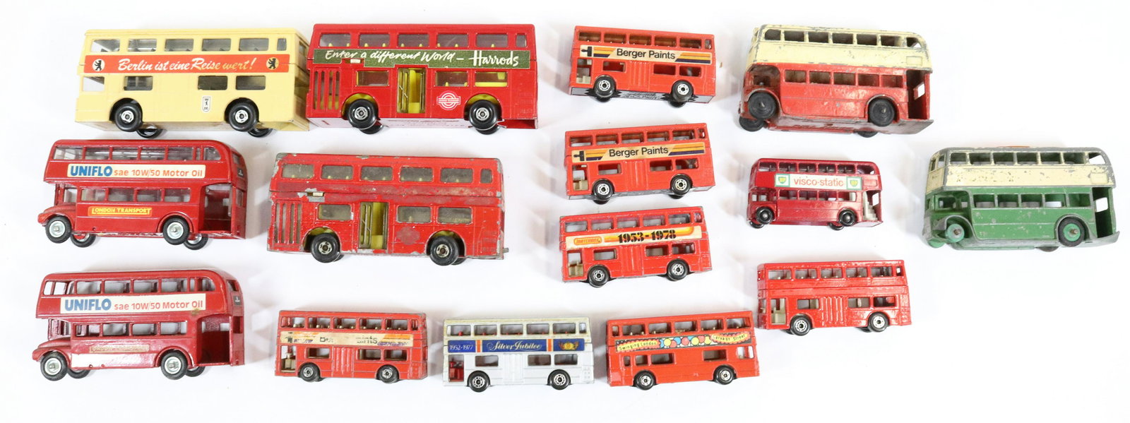 MATCHBOX AND BUDGIE DOUBLE DECKER BUSES: LARGEST 4 1/2" L. PLUS, TWO DINKY TOY BUSES.