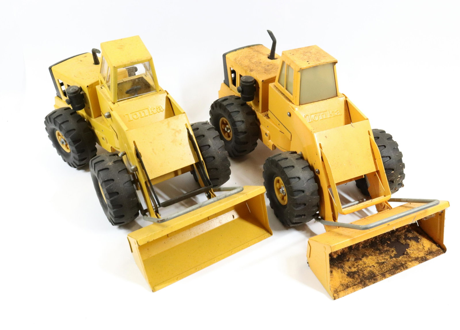 (2) TONKA TOYS LOADERS: PRESSED METAL WITH PLASTIC TIRES. 19" L.