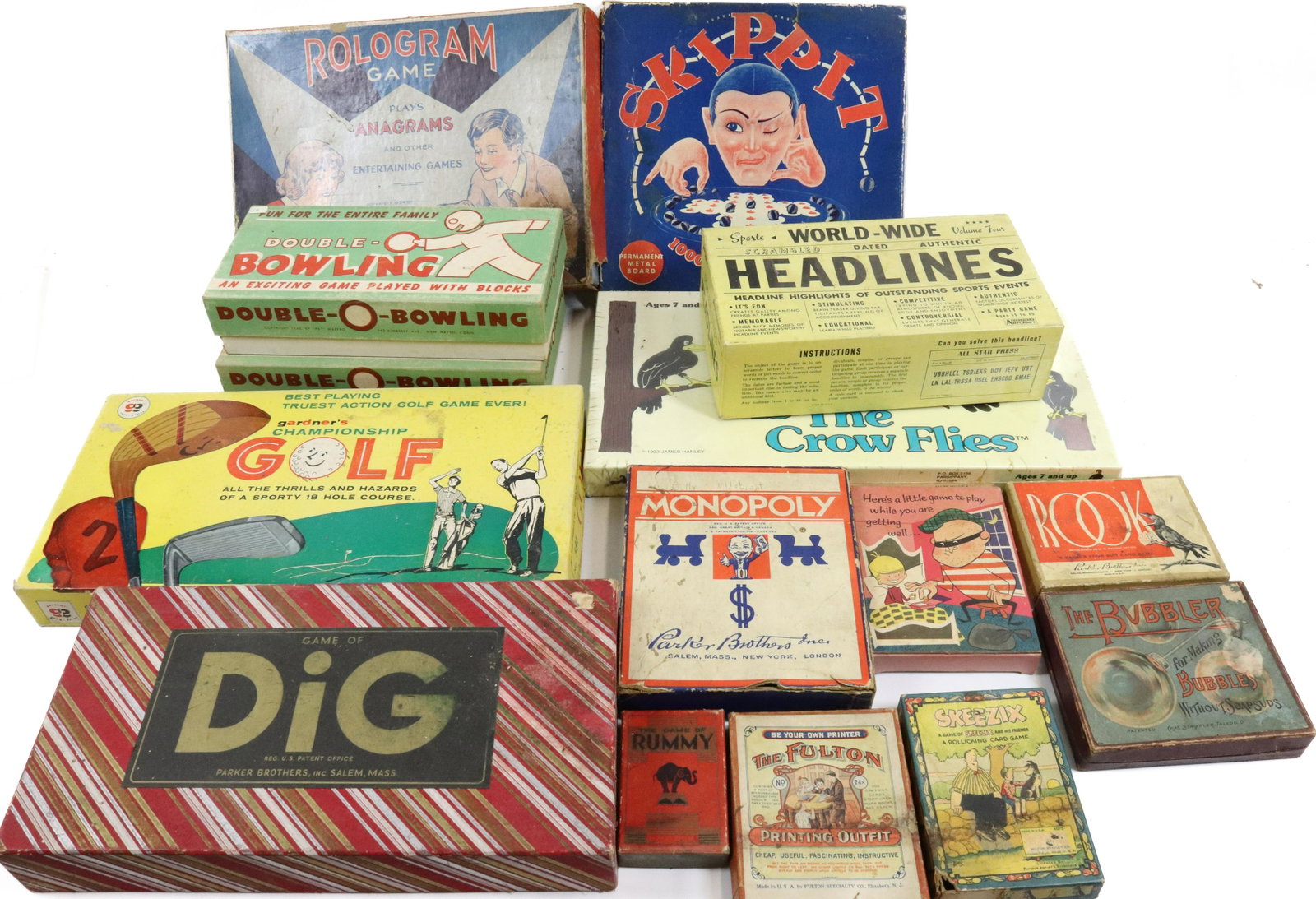 LOT OF VINTAGE BOARD AND CARD GAMES: DOUBLE BOWLING, SKIPPIT, HEADLINES, MONOPOLY AND MORE.