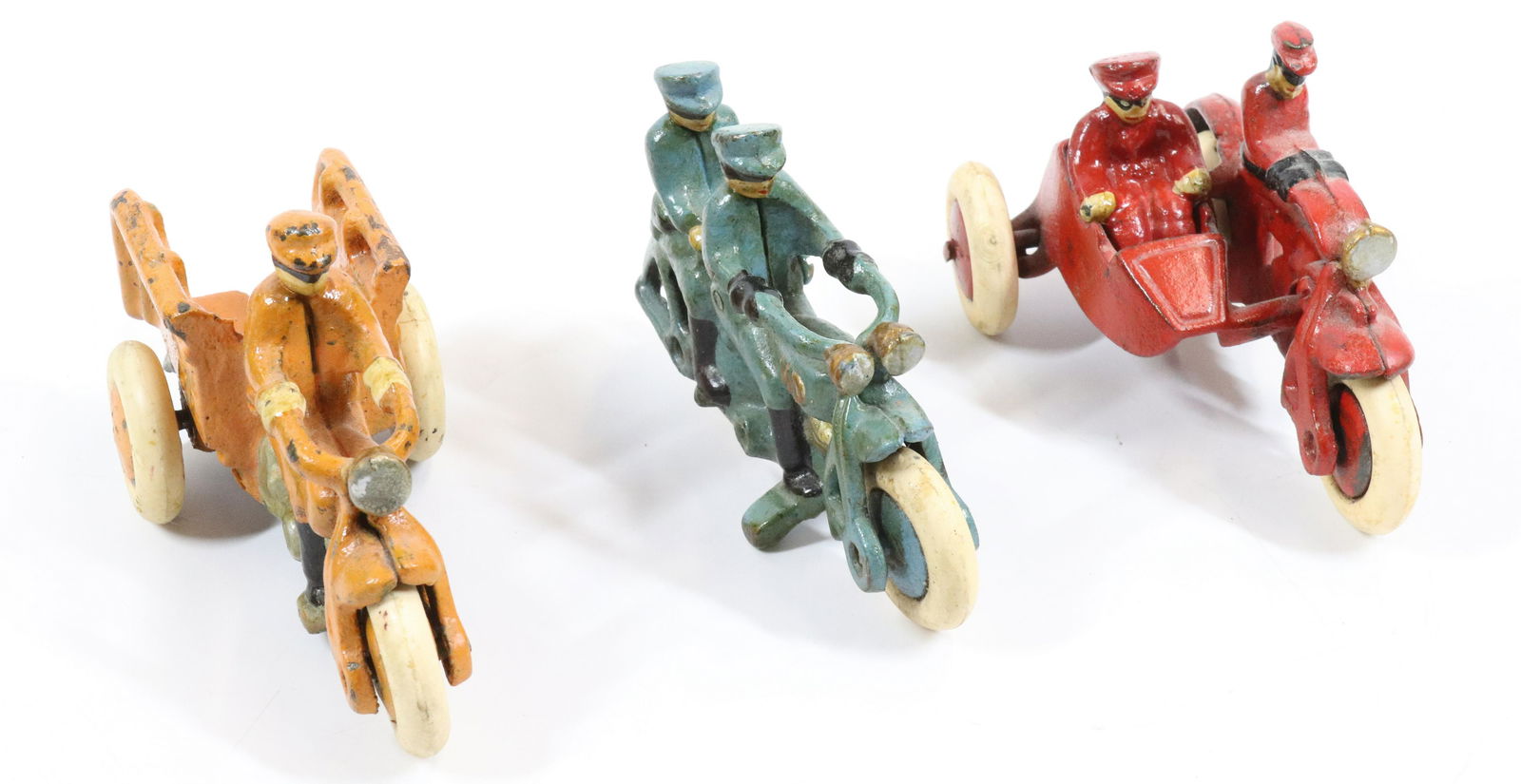 (3) CAST IRON TOY MOTORCYCLES: INCLUDING: CRASH CAR, HD (HARLEY DAVIDSON) AND RED HD WITH REMOVEABLE PASSENGER. 3 3/4" TO 4 3/4".