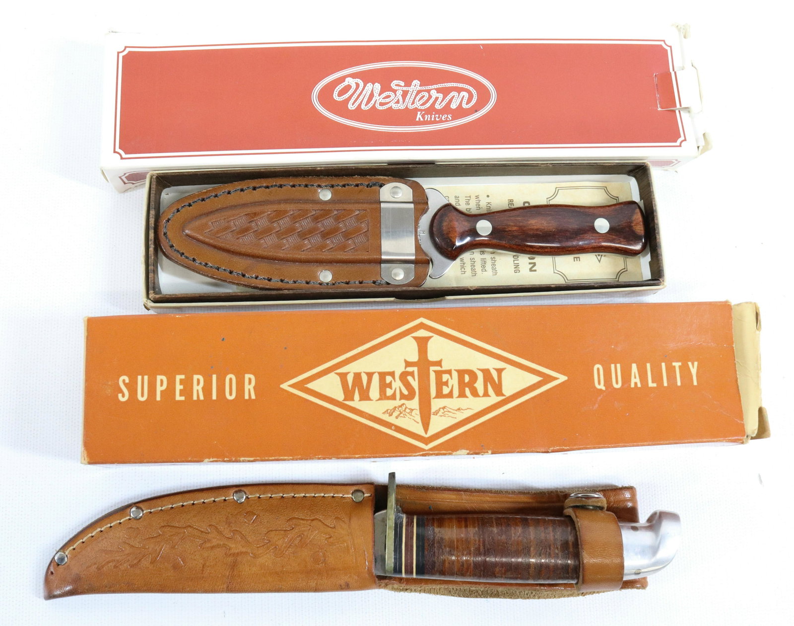 (2) WESTERN KNIVES: (2) NEW IN BOX WESTERN KNIVES - MODELS L66 AND W75 Terms: UPDATED 2023 TERMS FOR PURCHASING AND SHIPPING OF AUCTION ITEMS. PLEASE READ CAREFULLY BEFORE BIDDING. ALL PAYMENTS MUST BE MADE BEFORE ITEMS 