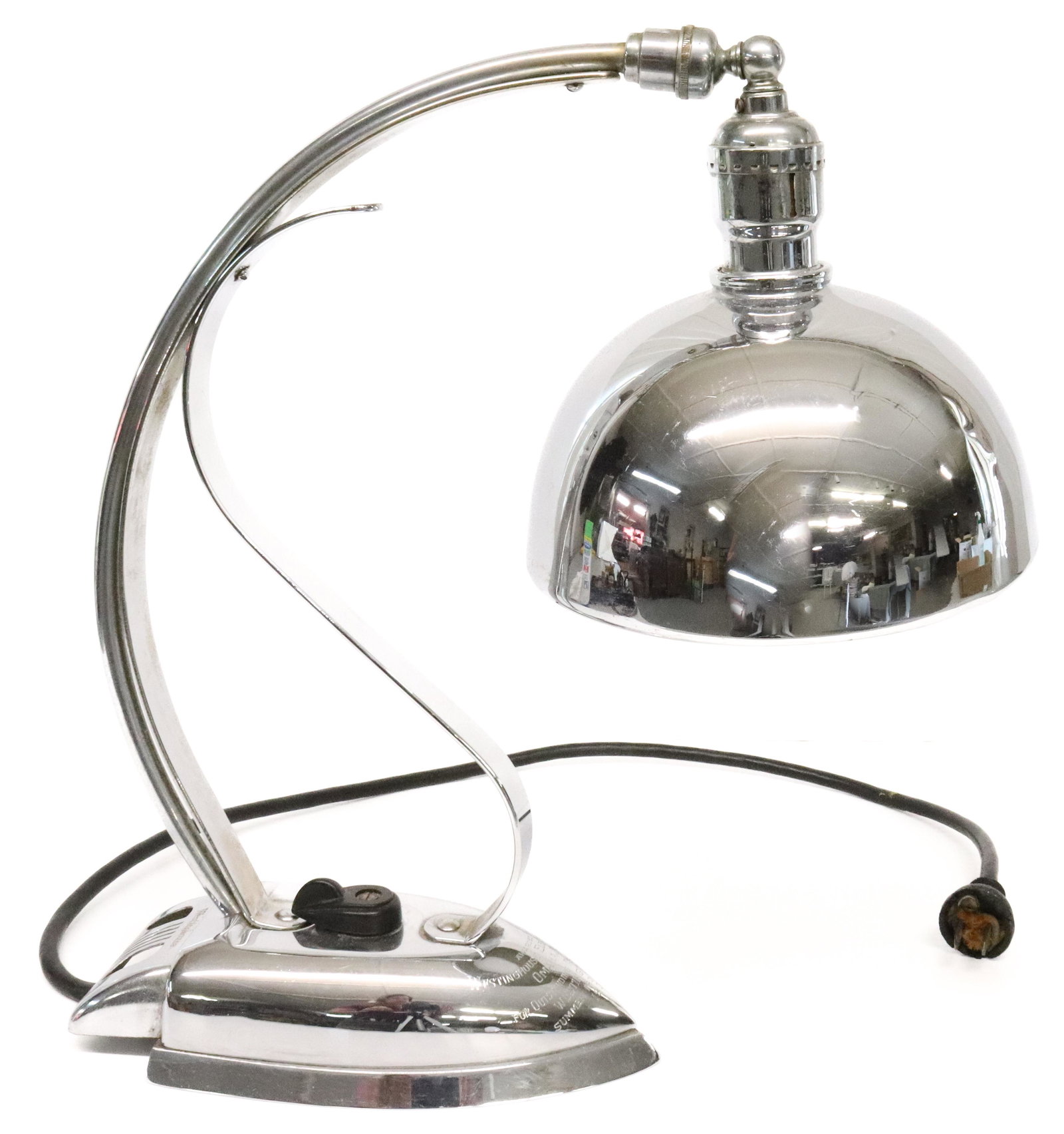 ART DECO CHROME WESTINGHOUSE IRON DESK LIGHT: DESK LIGHT AWARD WITH PRESSING IRON BASE ENGRAVED "AWARDED TO WESTINGHOUSE ELECTRIC SUPPLY CO., OMAHA, NEB., FOR OUTSTANDING PERFORMANCE, WESTINGHOUSE SUMMER IRON CAMPAIGN 1935". WORKING ORDER. BASE 8