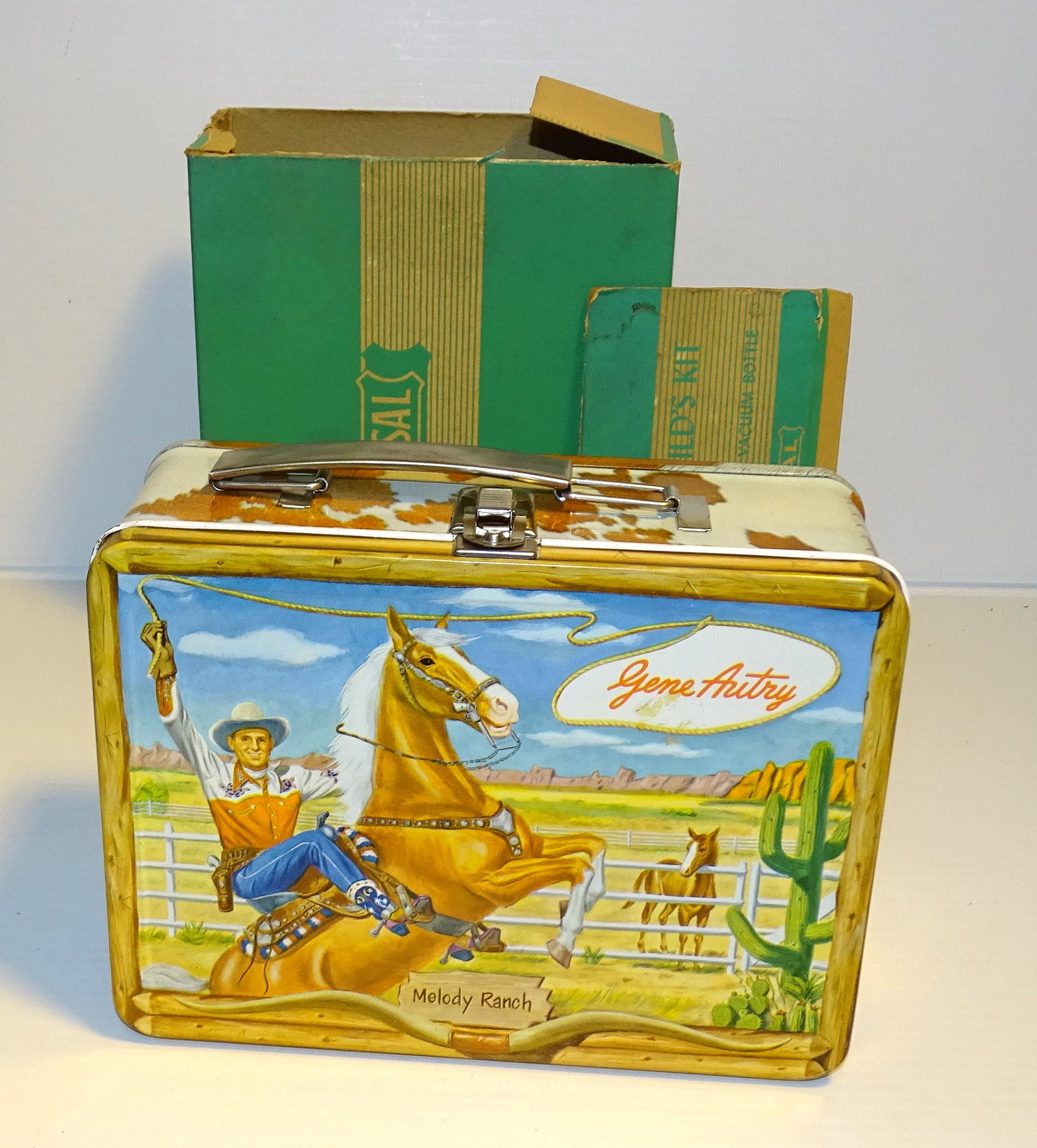 VINTAGE GENE AUTRY LUNCH BOX W/ THERMOS: 1954 GENE AUTRY METAL LUNCHBOX WITH MELODY RANCH THERMOS WITH BOX UPDATED 2023 Terms for Purchasing and Shipping of Auction Items. Please read carefully before bidding. All payments for purchases will