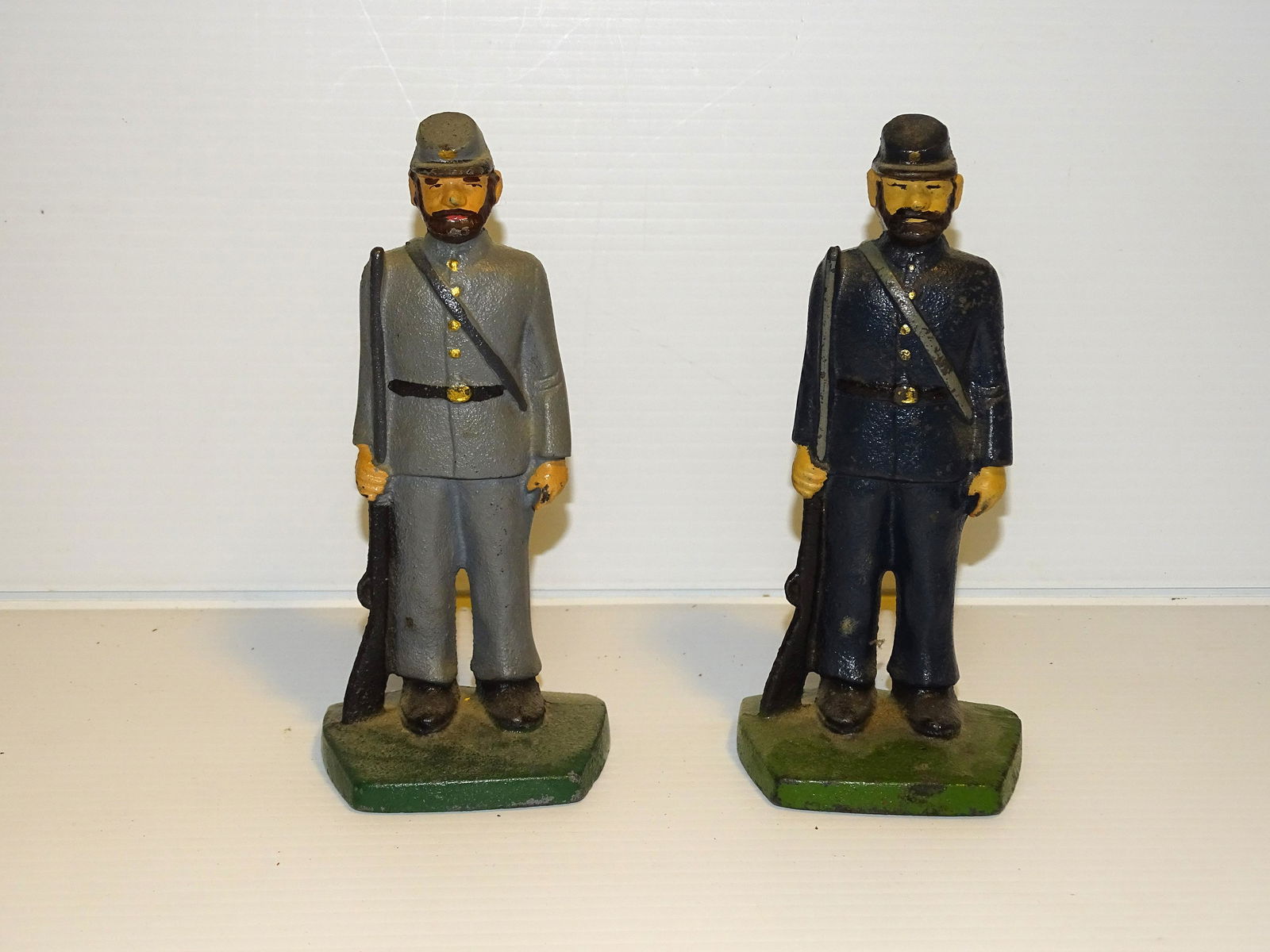 CAST IRON BOOKENDS: MILITARY UPDATED 2023 Terms for Purchasing and Shipping of Auction Items. Please read carefully before bidding. All payments for purchases will be made through LiveAuctioneers.com payment processing c