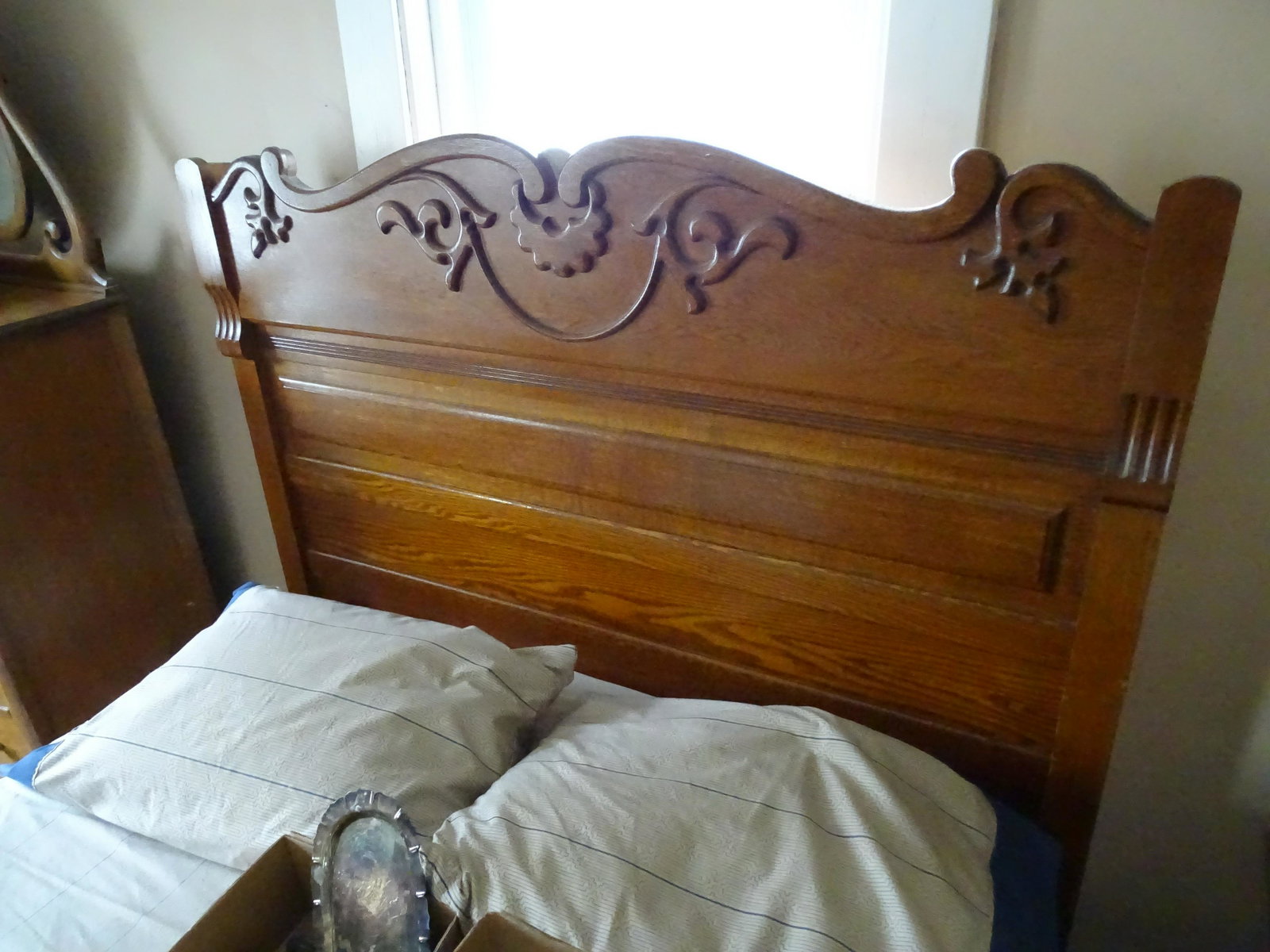 OAK BED: HIGH OAK BED WITH FOOTBOARD, 56 1/2" x 56" UPDATED 2023 Terms for Purchasing and Shipping of Auction Items. Please read carefully before bidding. All payments for purchases will be made through LiveAu