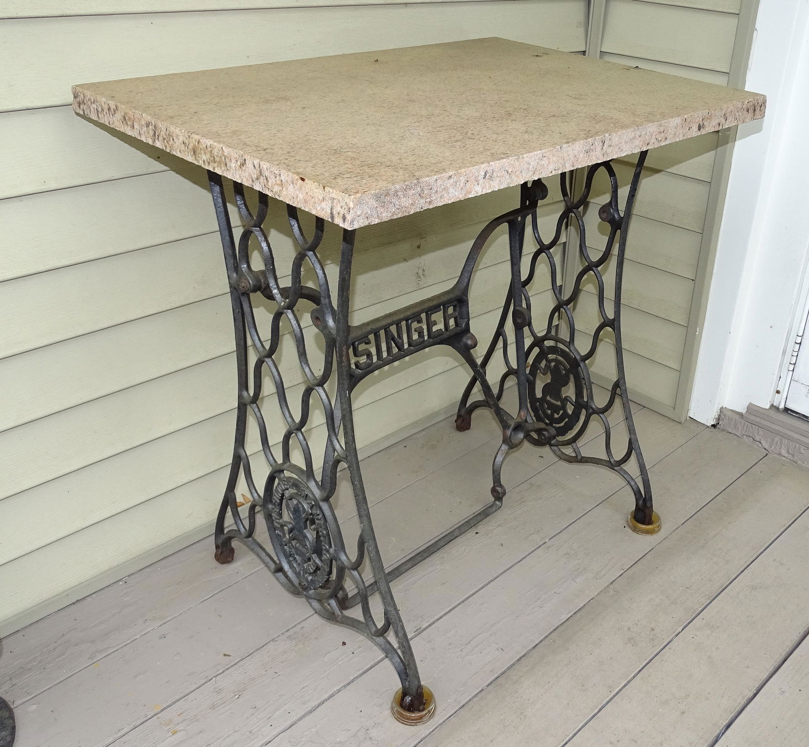 GRANITE TOP TABLE: PINK GRANITE SINGER IRON TREADLE BASE 29 1/2"H X 29" X 20" UPDATED 2023 Terms for Purchasing and Shipping of Auction Items. Please read carefully before bidding. All payments for purchases will be mad