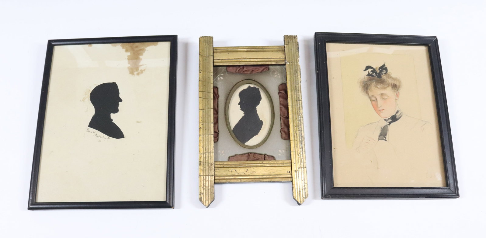 ANTIQUE SILHOUETTES AND SKETCH: SILHOUETTE OF A WOMAN IN SILK/RIBBON MAT WITH GOLD FRAME (SIGHT VIEW 3 1/4"), SILHOUETTE OF A MAN MRKD. JUSTICE LEON SR. (TOTAL SIZE 9" X 7") AND FRAMED SKETCH OF A WOMAN WITH WATERCOLOR HIGHLIGHTS (T