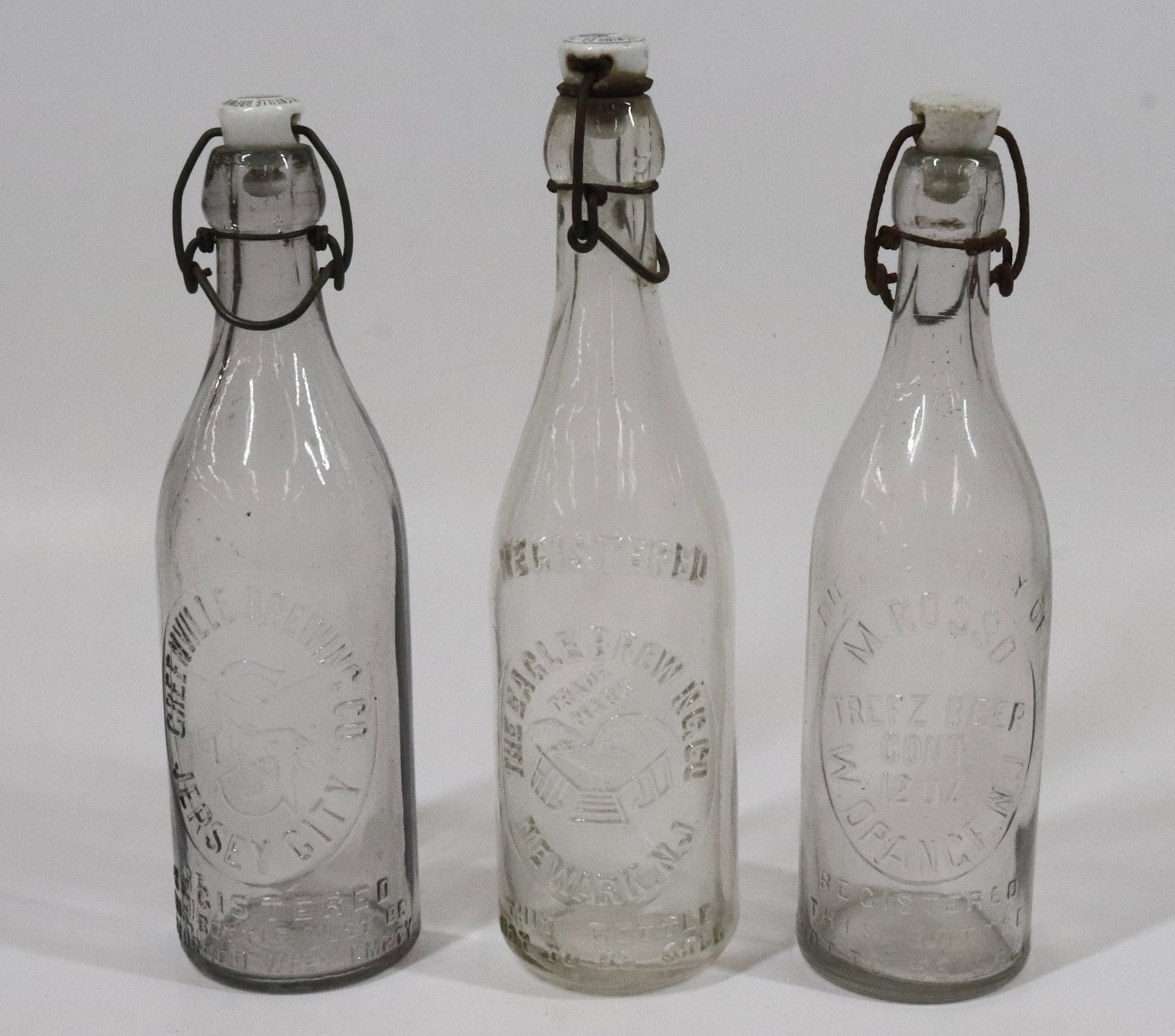 (3) NJ PORCELAIN TOP BEER BOTTLES (1 of 4)