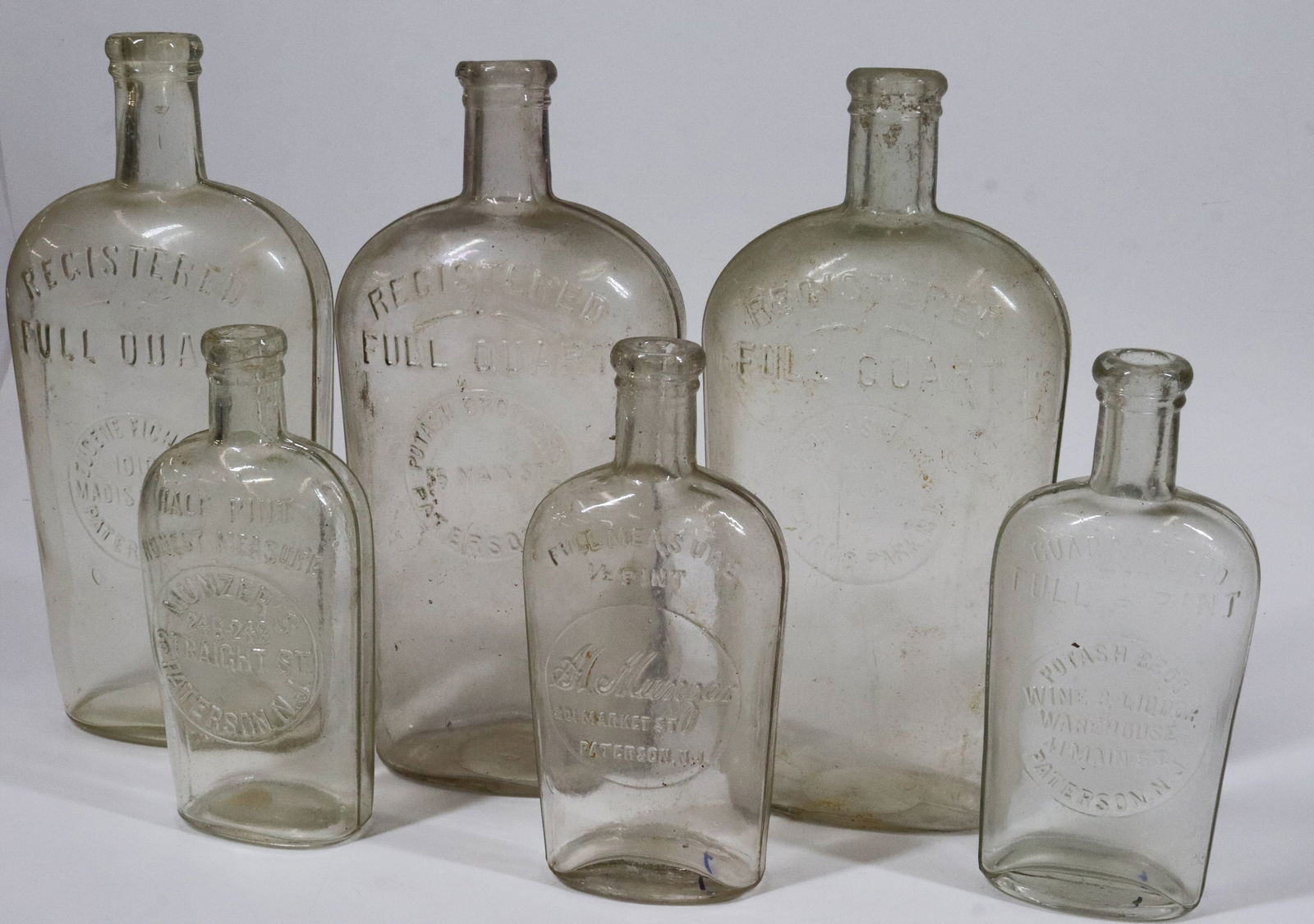 LOT OF VINTAGE PATERSON, NJ FLASK BOTTLES (1 of 3)