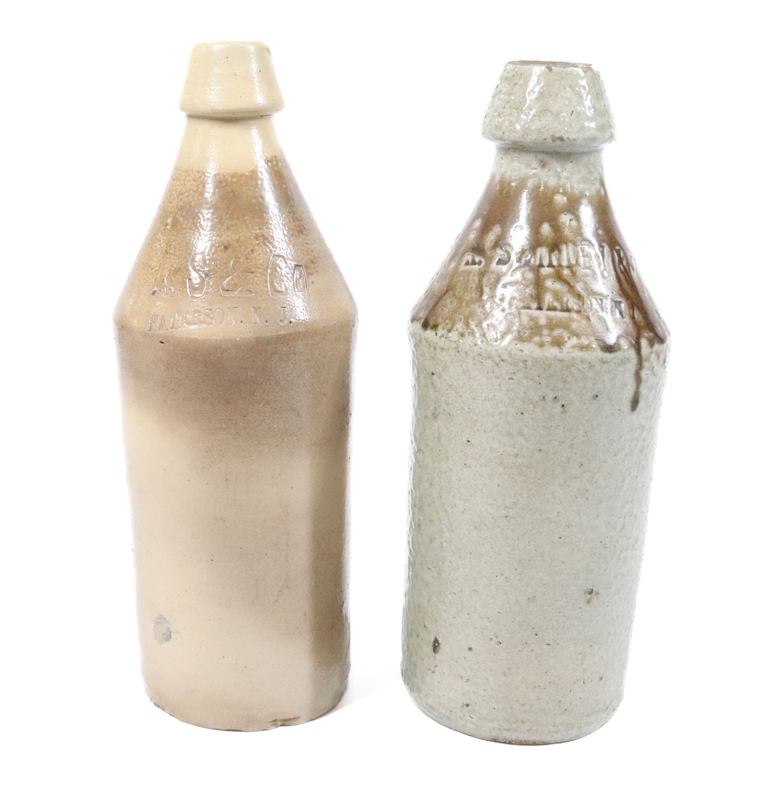 (2) STONEWARE ADVERTISING BOTTLES (1 of 5)