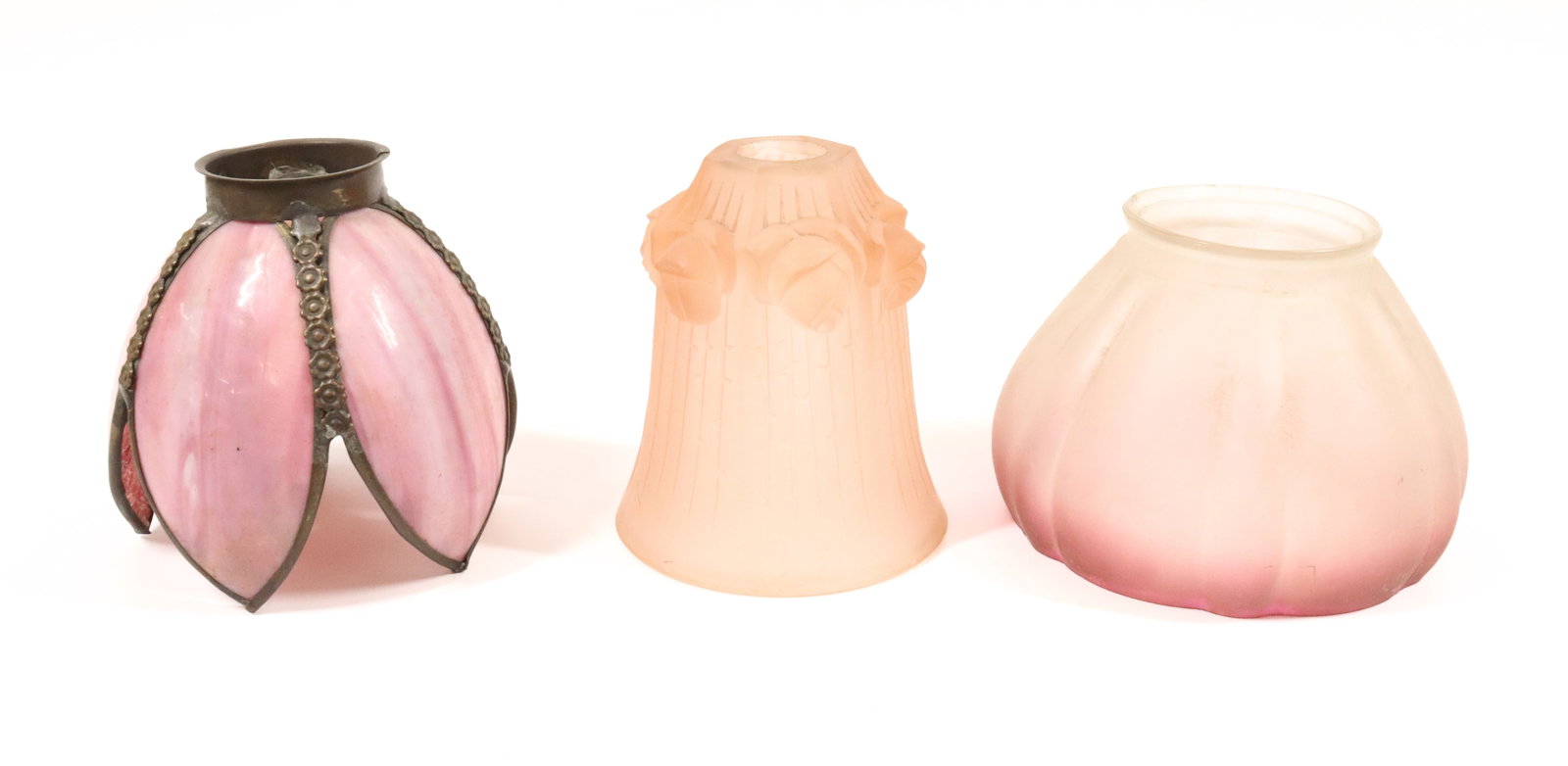 LOT OF PINK SHADES: INCLUDING: SLAG GLASS FIVE PANEL PETAL SHAPED (TWO CRACKED) 5 1/4" X 5". FITTER 2 1/4". FROSTED OMBRE SHADE 4 1/2" X 6" FITTER 3 1/4". EMBOSSED FLORAL 5 1/4" X 4 1/2" OPENING IS 1 1/4". PLEASE READ CA