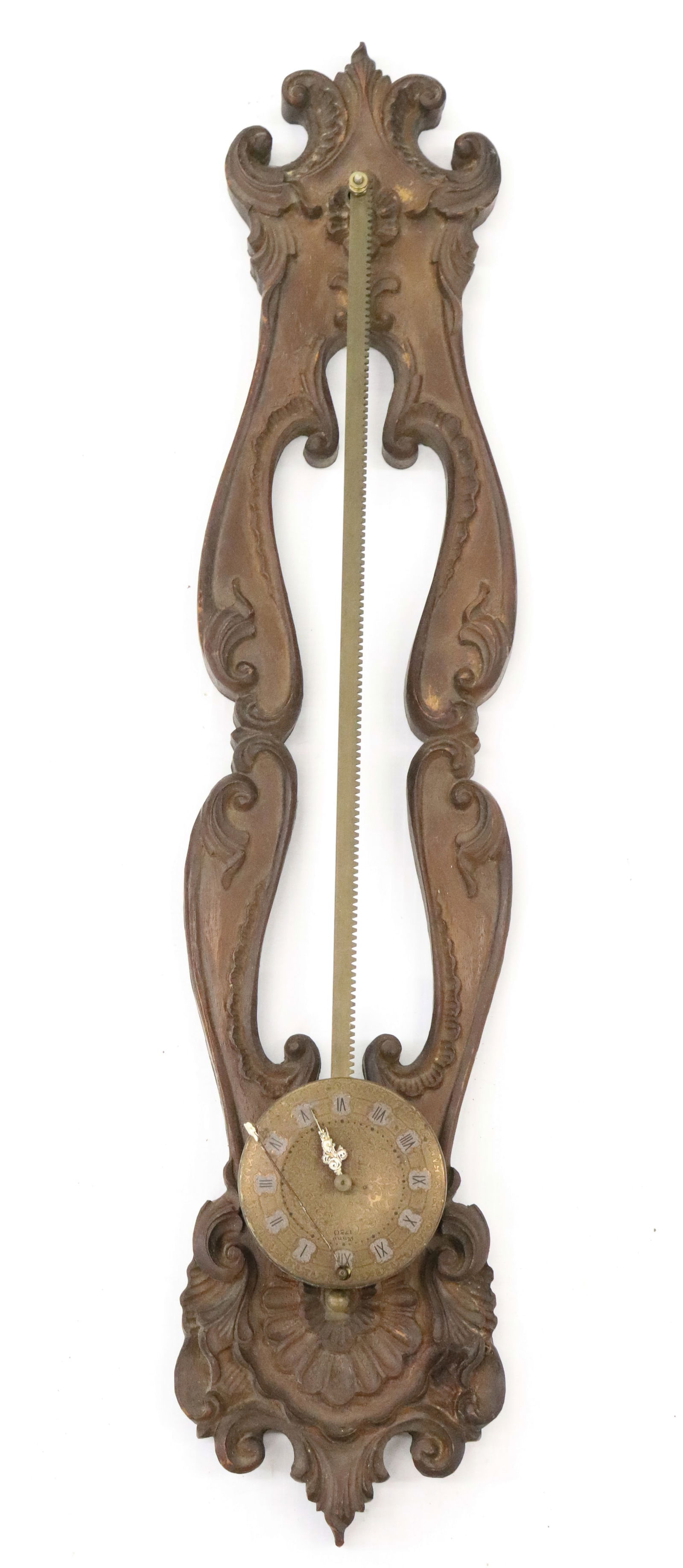 GERMAN ANNO SAW TOOTH GRAVITY CLOCK: BRASS AND CARVED WOOD 26". GERMAN INSTRUCTIONS ON BACK. FACE IS MRKD. ANNO 1750. PLEASE READ CAREFULLY - Terms for Purchasing and Shipping of Auction Items. Please read carefully before bidding. All p