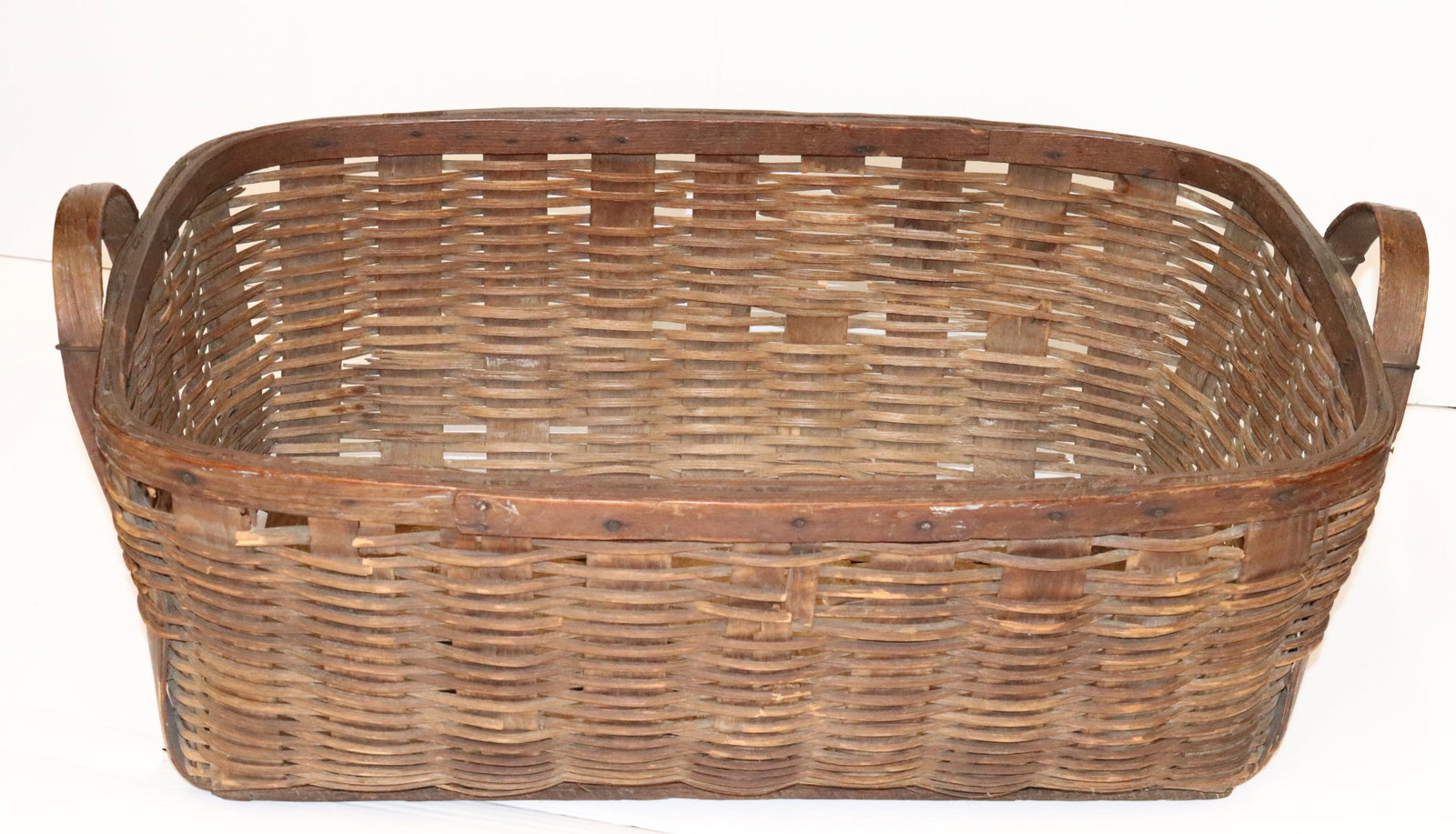 RECTANGULAR WOVEN BASKET: BENTWOOD HANDLES. 29" L. PLEASE READ CAREFULLY - Terms for Purchasing and Shipping of Auction Items. Please read carefully before bidding. All payments for purchases will be made through LiveAuctionee