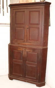 EARLY BLIND FRONT CORNER CUPBOARD: TWO-PIECE CUPBOARD WITH TWO PANELED DOORS OVER TWO PANELED DOORS. PAINTED SURFACE AND INTERIOR. 76" X 40" X 22". PLEASE READ CAREFULLY - Terms for Purchasing and Shipping of Auction Items. Please read