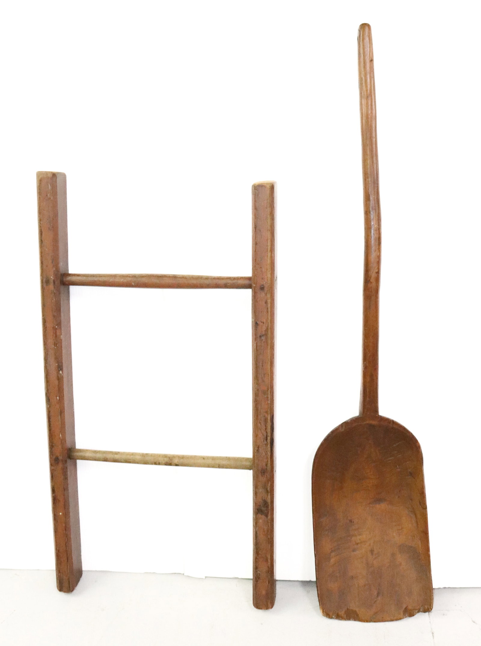 WOODEN GRAIN SHOVEL AND LADDER: HAND CARVED SHOVEL 45" L. AND SMALL LADDER SECTION 34" L. PLEASE READ CAREFULLY - Terms for Purchasing and Shipping of Auction Items. Please read carefully before bidding. All payments for purchases w