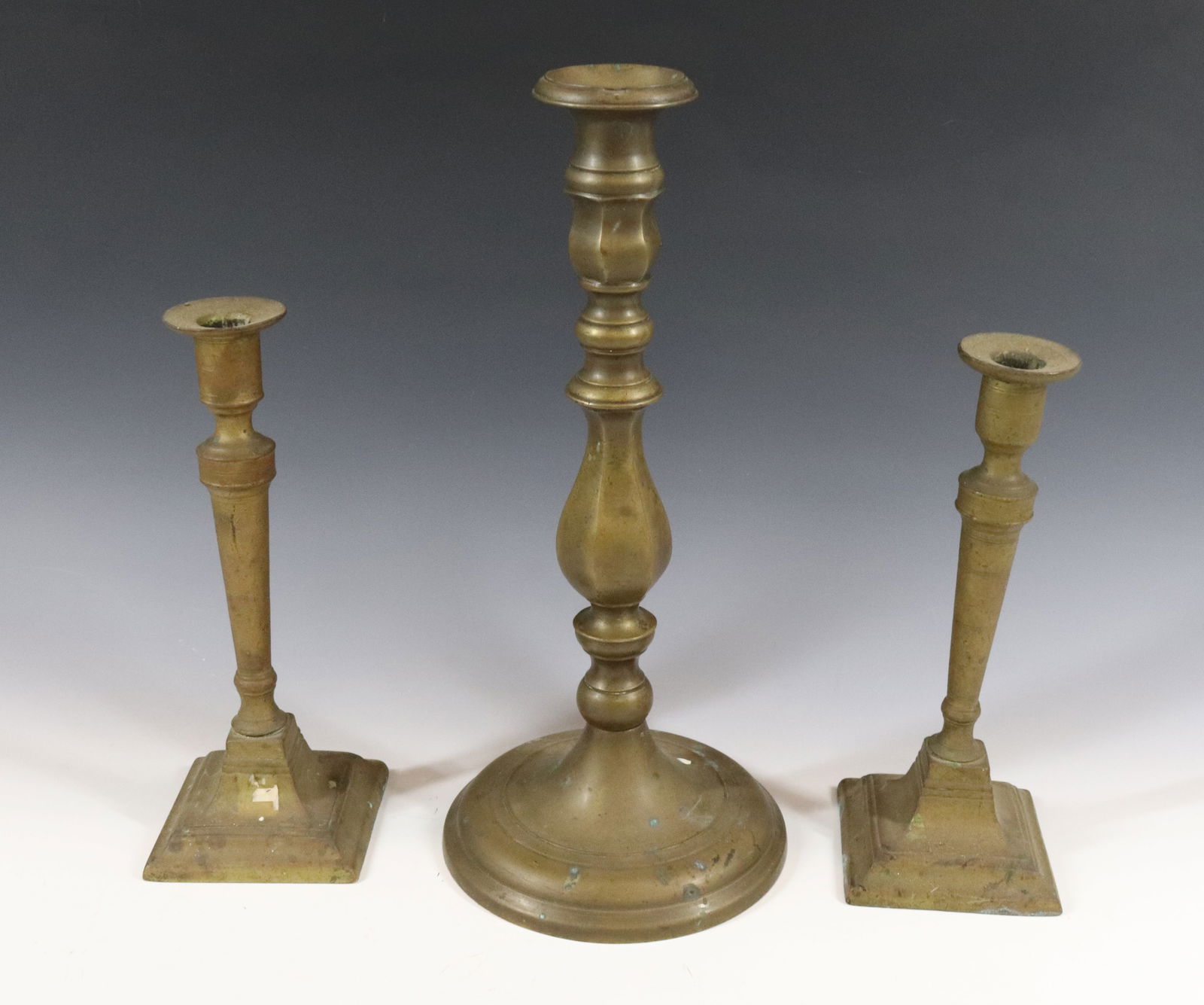(3) EARLY BRASS CANDLESTICKS (1 of 3)