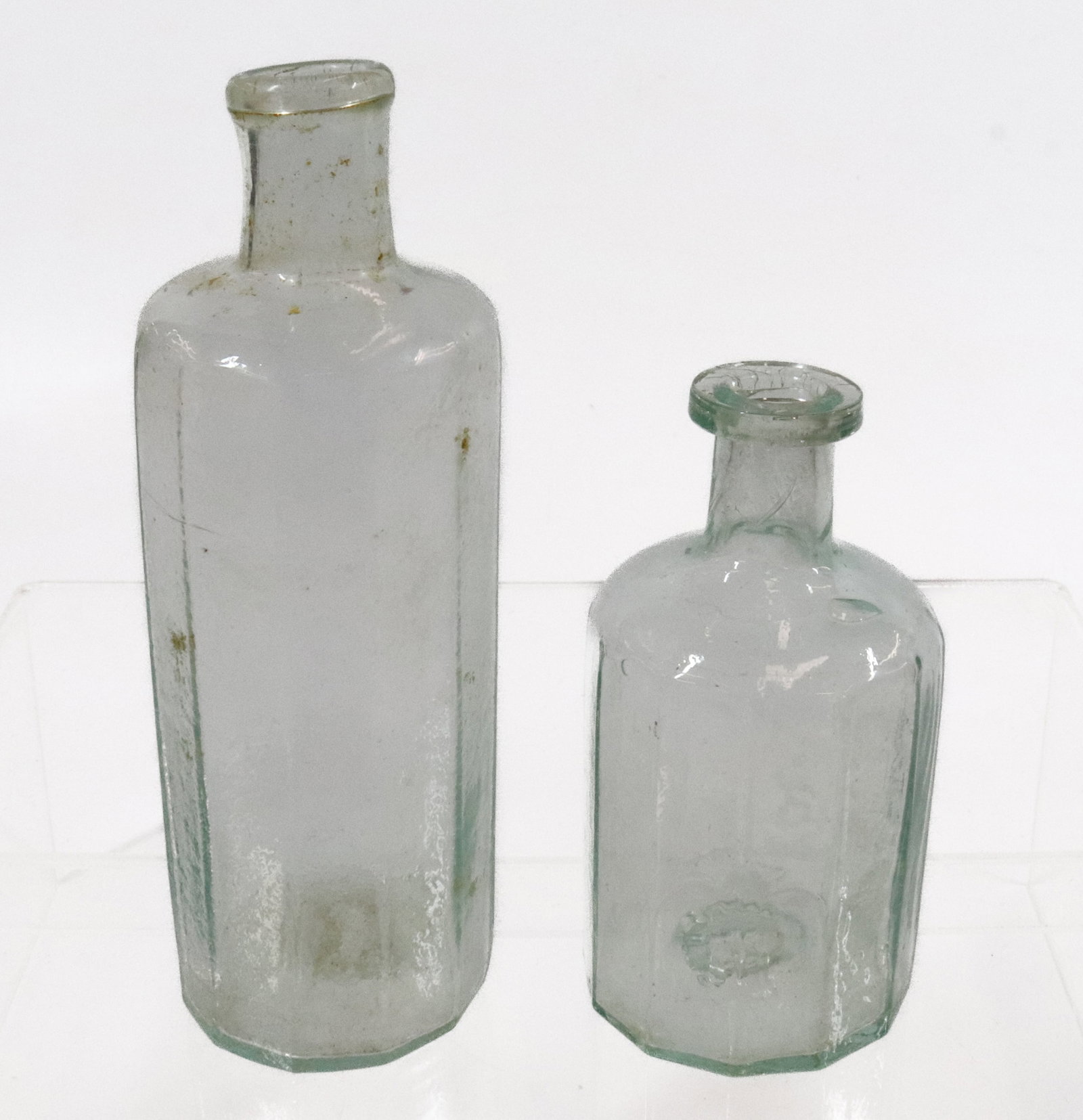 (2) BLOWN IN MOLD BOTTLES (1 of 7)