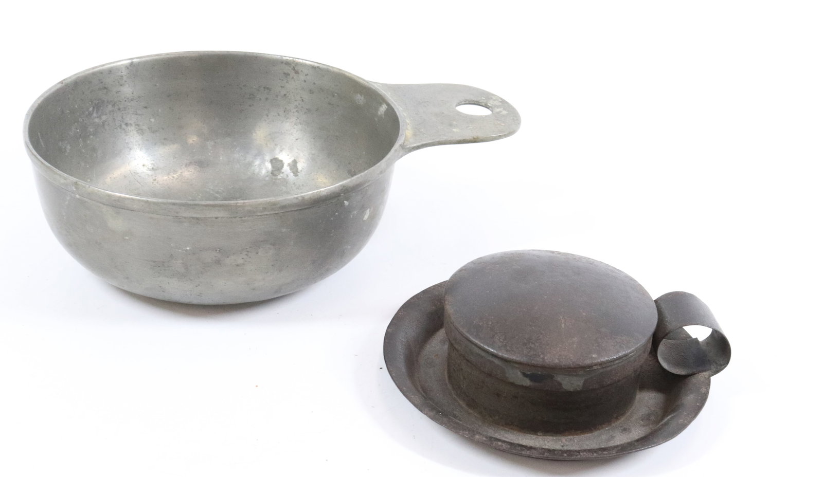 ANTIQUE TINDERBOX AND PEWTER PORRINGER : TINDER BOX HAS HINGED LID AND ATTACHED SAUCER - PORRINGER MARKED "JS" WITH EAGLE AND STARS - 4 1/4" AND 5 1/4" DIAMETER Terms: PLEASE READ CAREFULLY - Terms for Purchasing and Shipping of Auction Item