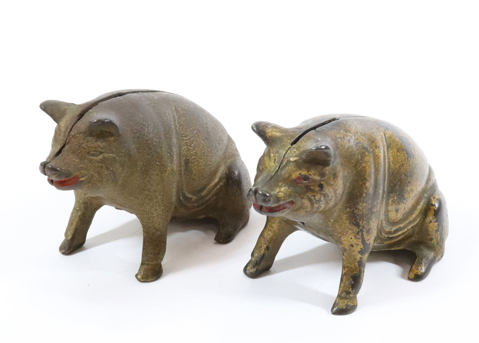 (2) CAST IRON PIG BANKS (1 of 4)