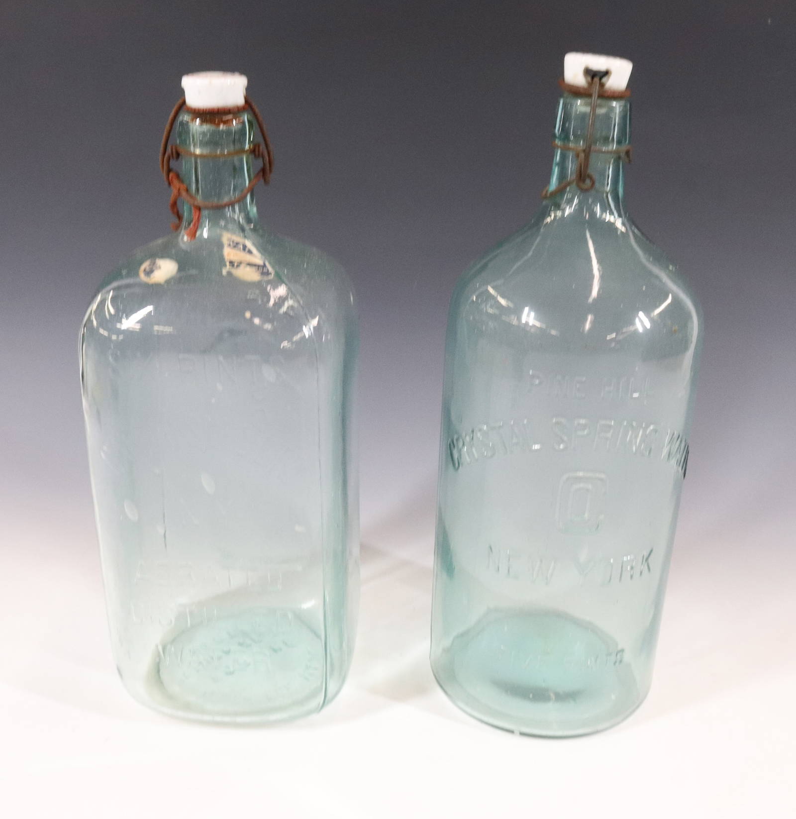 (2) Antique Water Bottles Auction