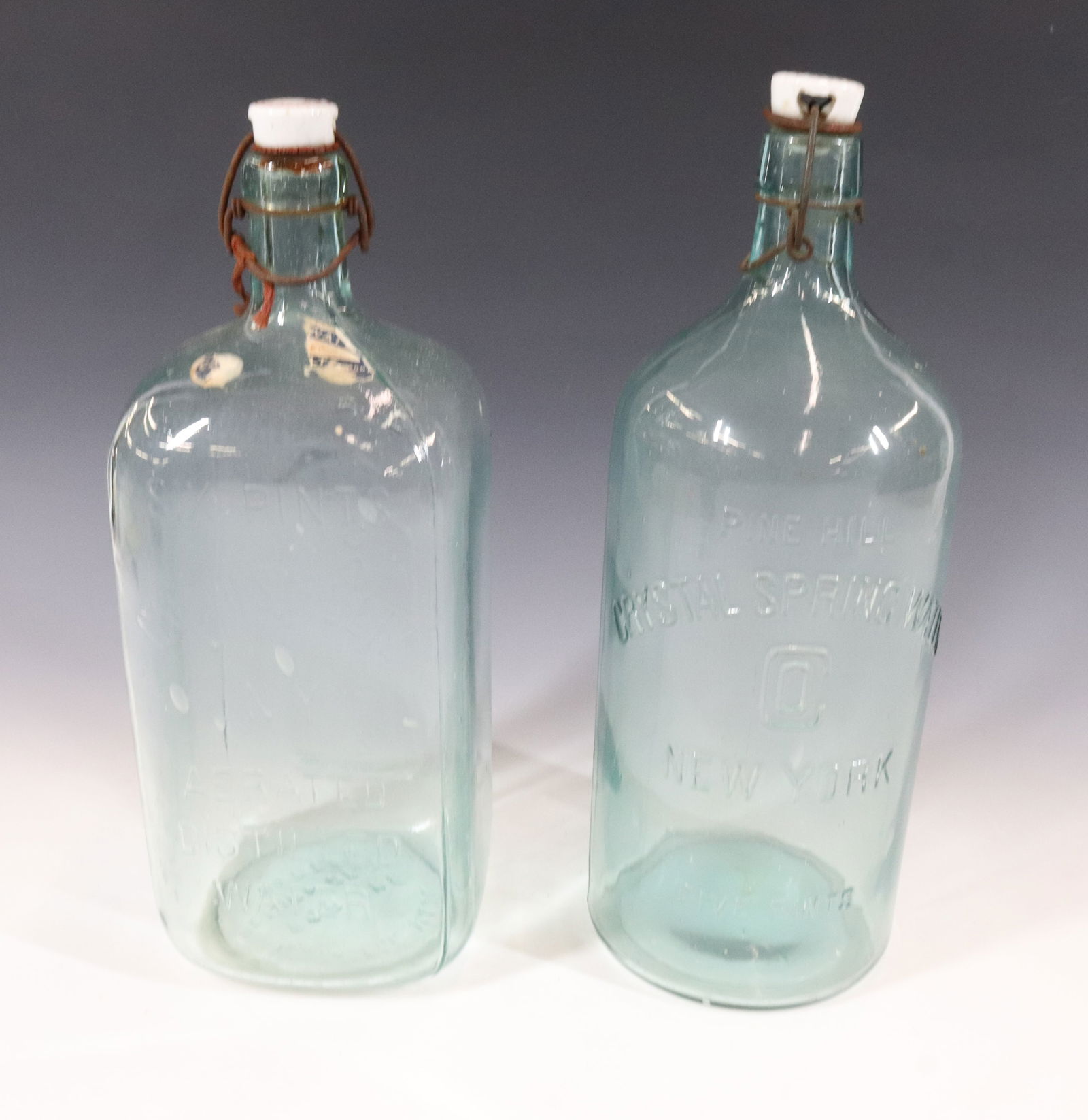 (2) Antique Water Bottles Auction