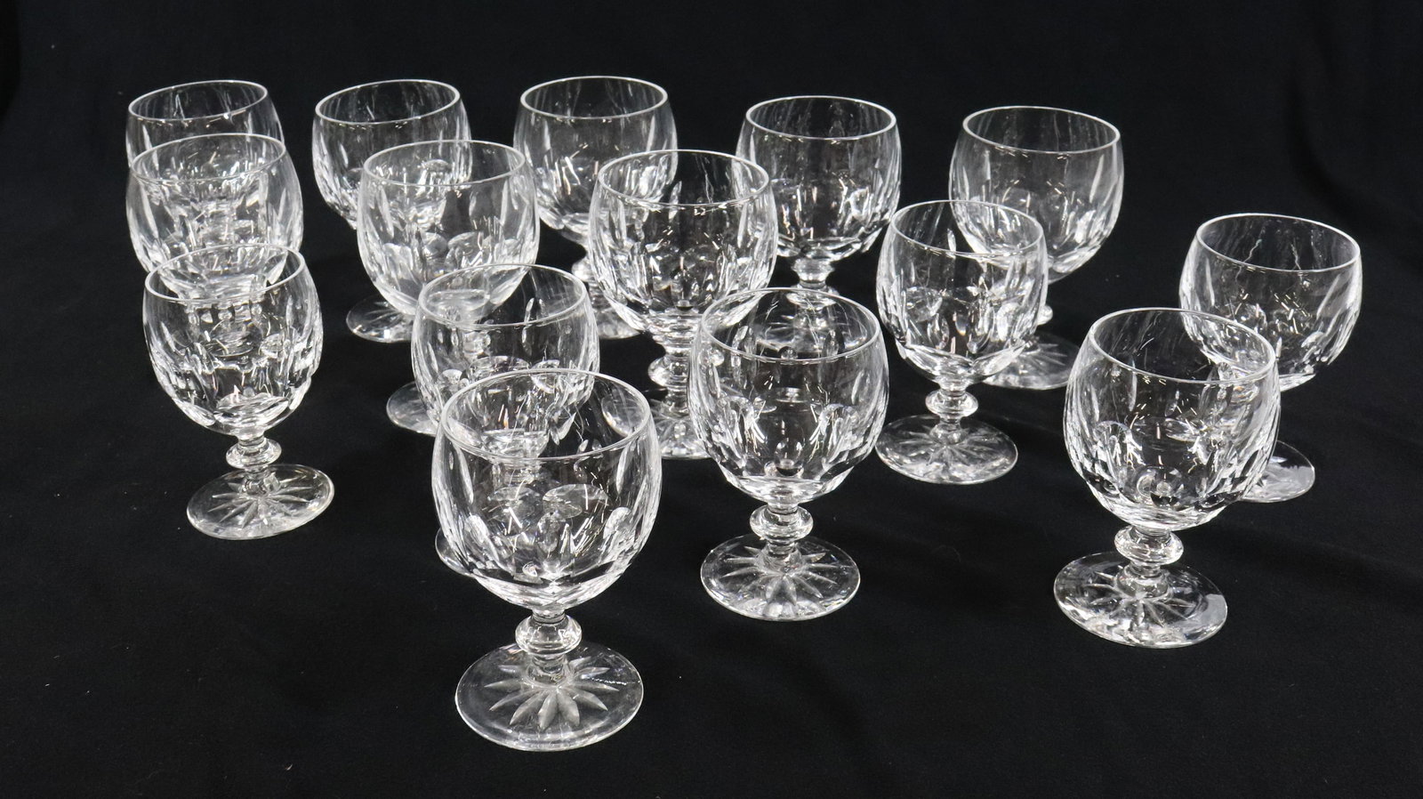 KOSTA BODA STEMWARE: (15) (8) WHITE WINE GOBLETS AND (7) SHERRY GLASSES MONA PATTERN 4" X 2 3/4" DIA, 3 1/2" X 2 1/4" WITH COPY OF RECEIPT 1978 Terms: PLEASE READ CAREFULLY - Terms for Purchasing and Shipping of Auction I