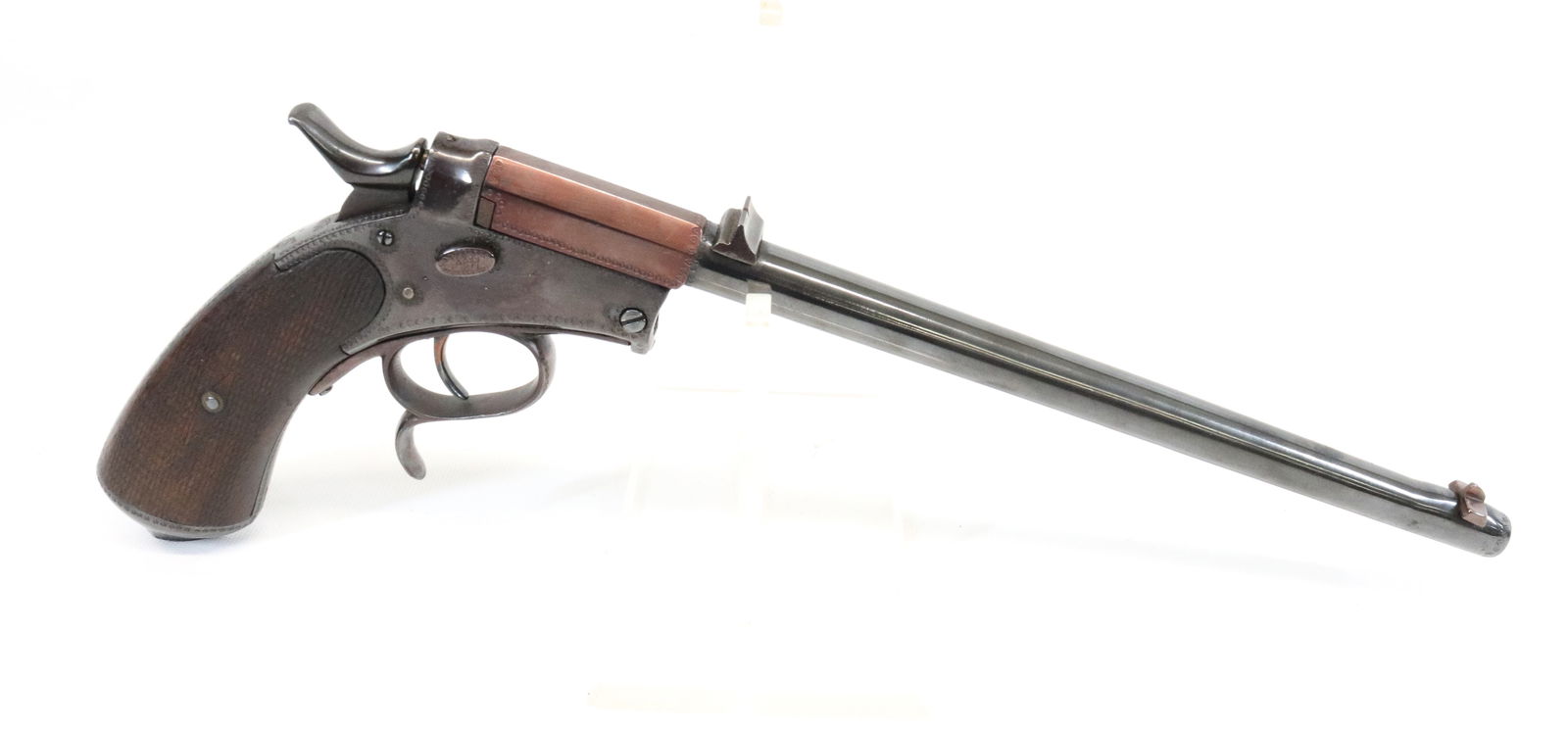 GERMAN SINGLE SHOT TARGET PISTOL: .22 CAL, SERIAL# NA - 11" BLUED BARREL WITH WALNUT GRIPS Registration: THIS GUN REQUIRES REGISTRATION OR FFL TRANSFER Terms: UPDATED 2023 TERMS FOR PURCHASING AND SHIPPING OF AUCTION ITEMS. PLEASE REA