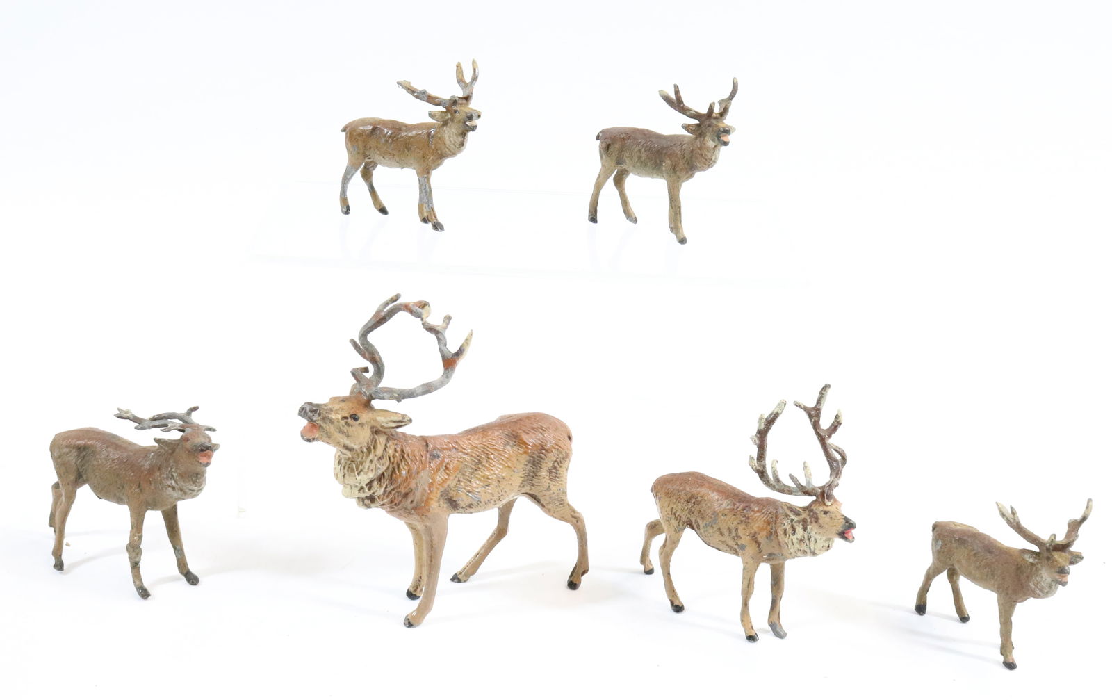 (6) PAINTED METAL ELK: LARGEST 4 1/2" X 4". TWO MRKD. GERMANY.