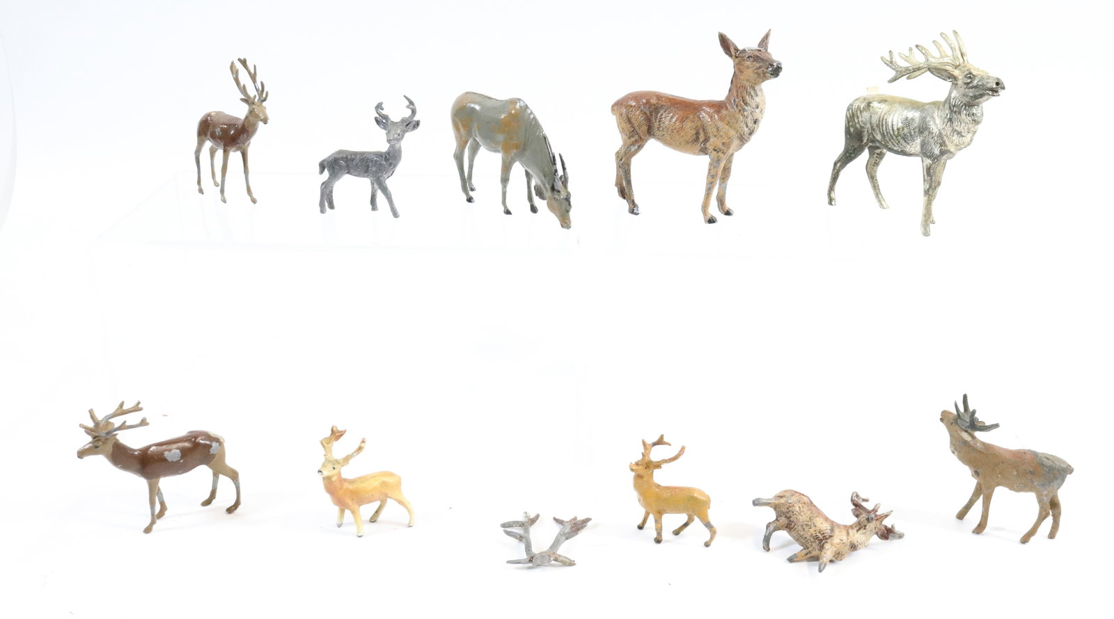 LOT OF PAINTED METAL DEER: LARGEST 3 1/2" X 3 1/4".
